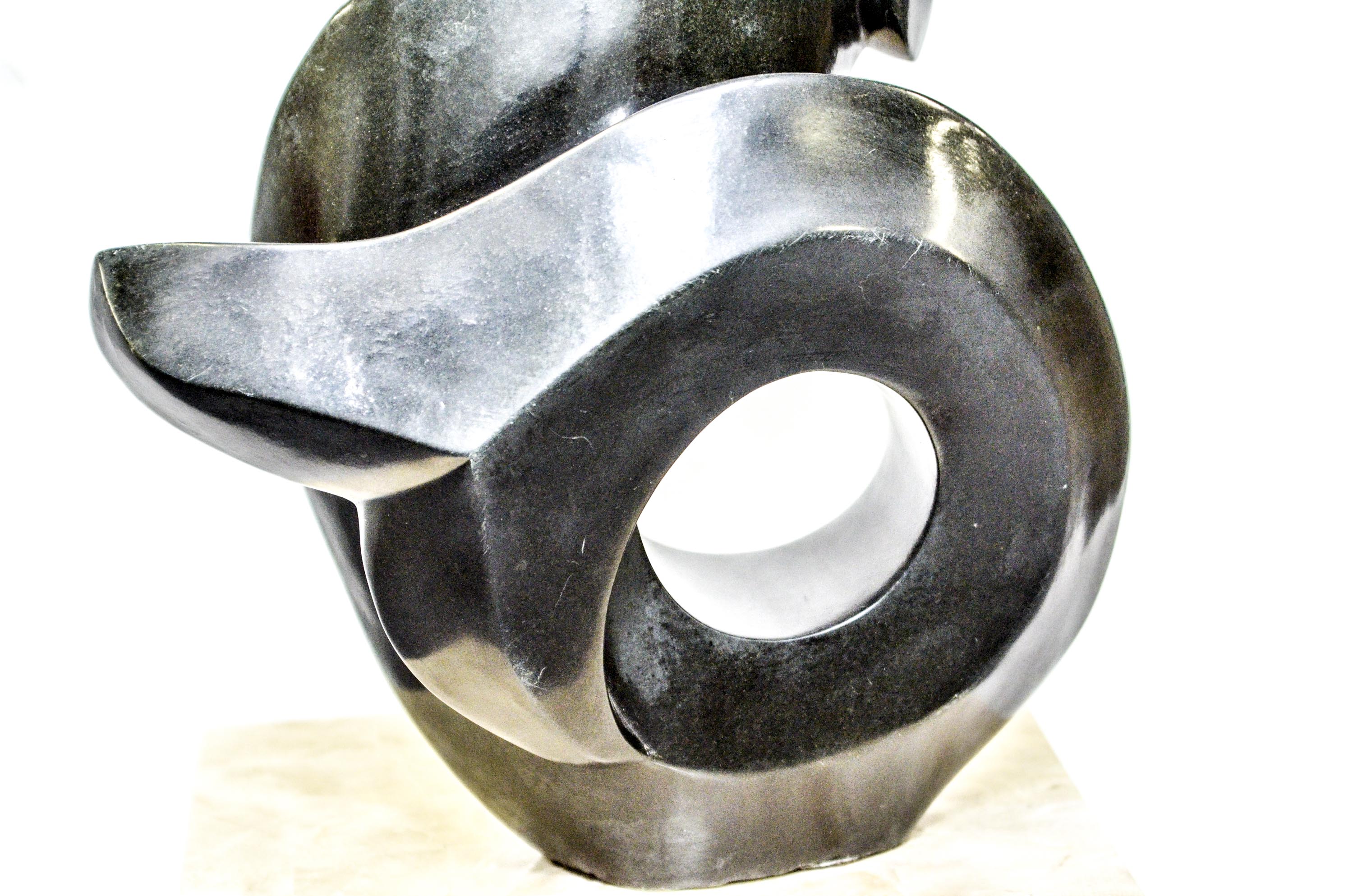 Black Stone Sculpture by T. Munemo titled "Water Spirit"