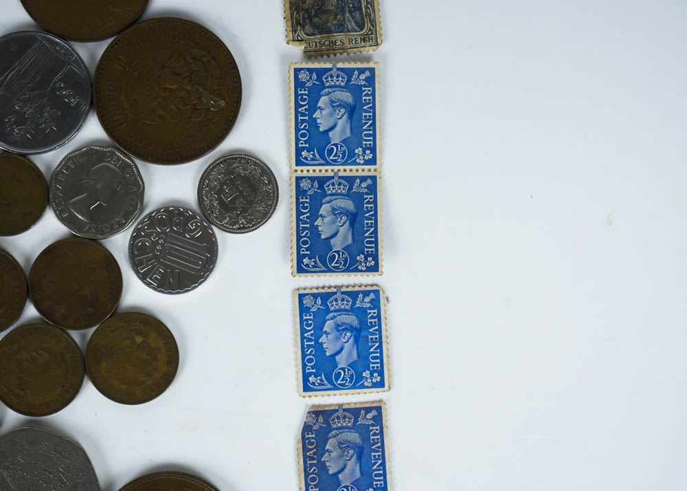 Large Assortment of Coins, Currency and Stamps