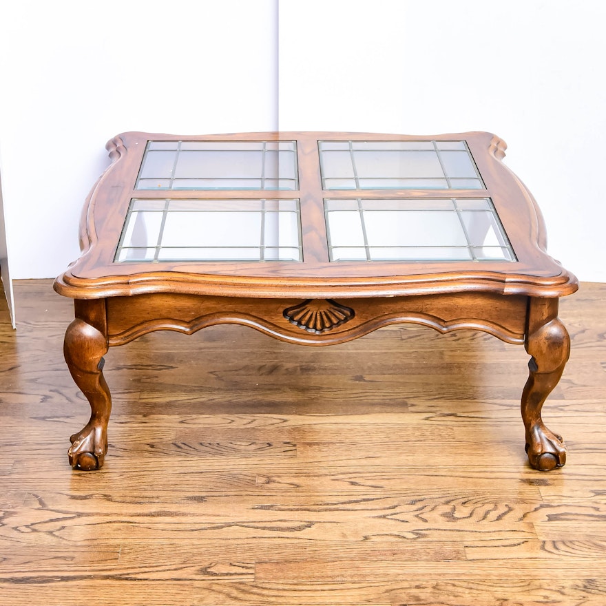 An Oak Finish Glass Top Coffee Table with Four Glass Inserts