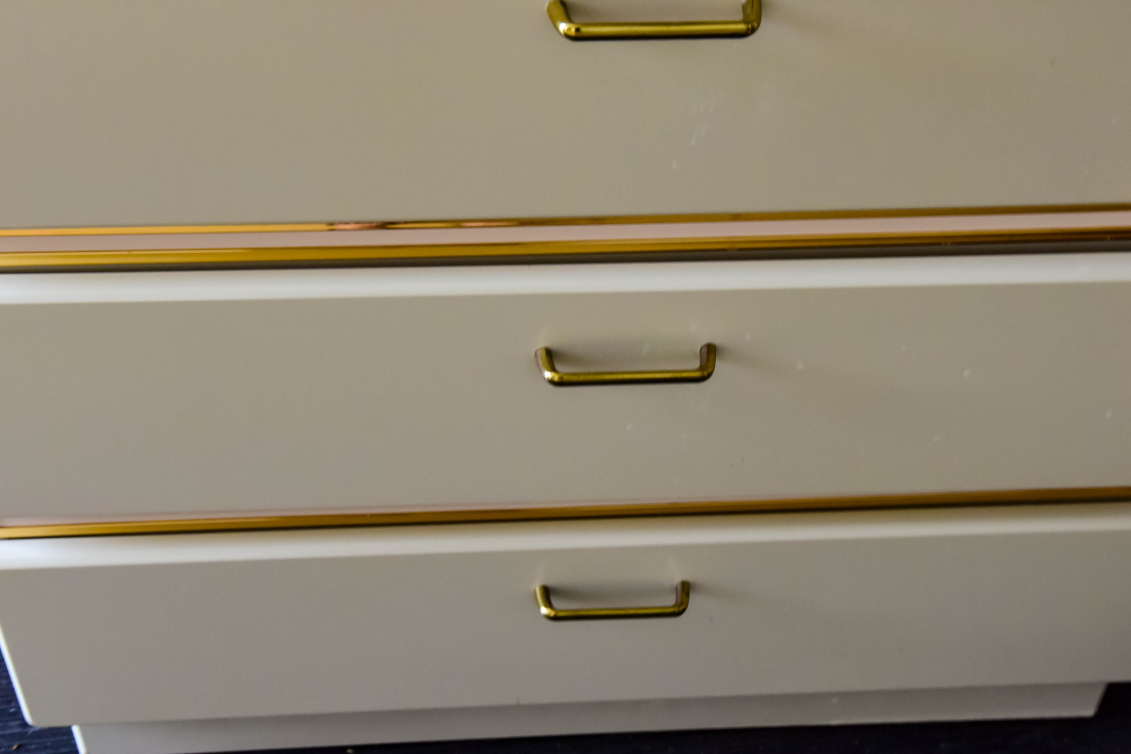 White Wooden Dresser with Gold Tone Trim