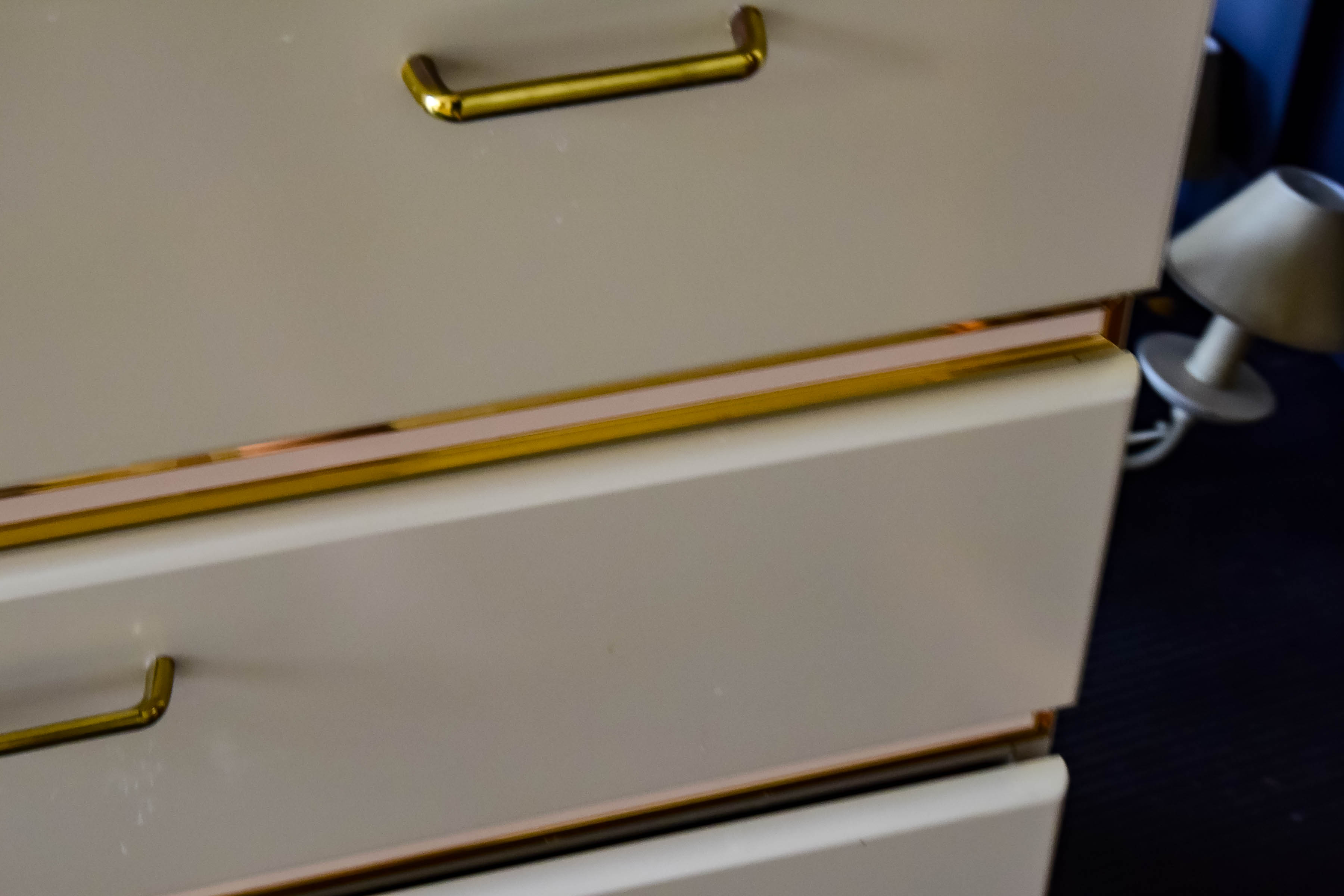 White Wooden Dresser with Gold Tone Trim