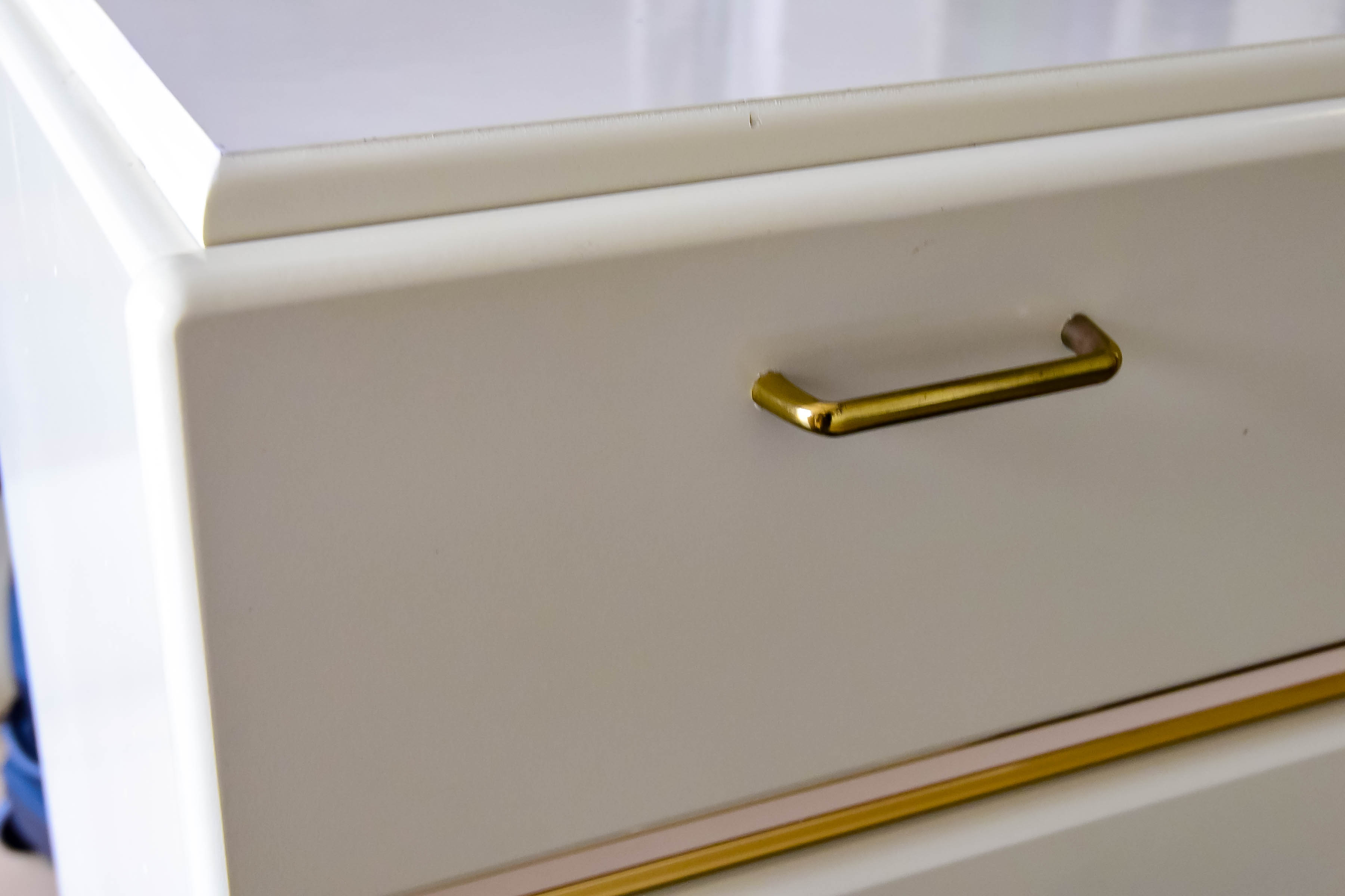 White Wooden Dresser with Gold Tone Trim