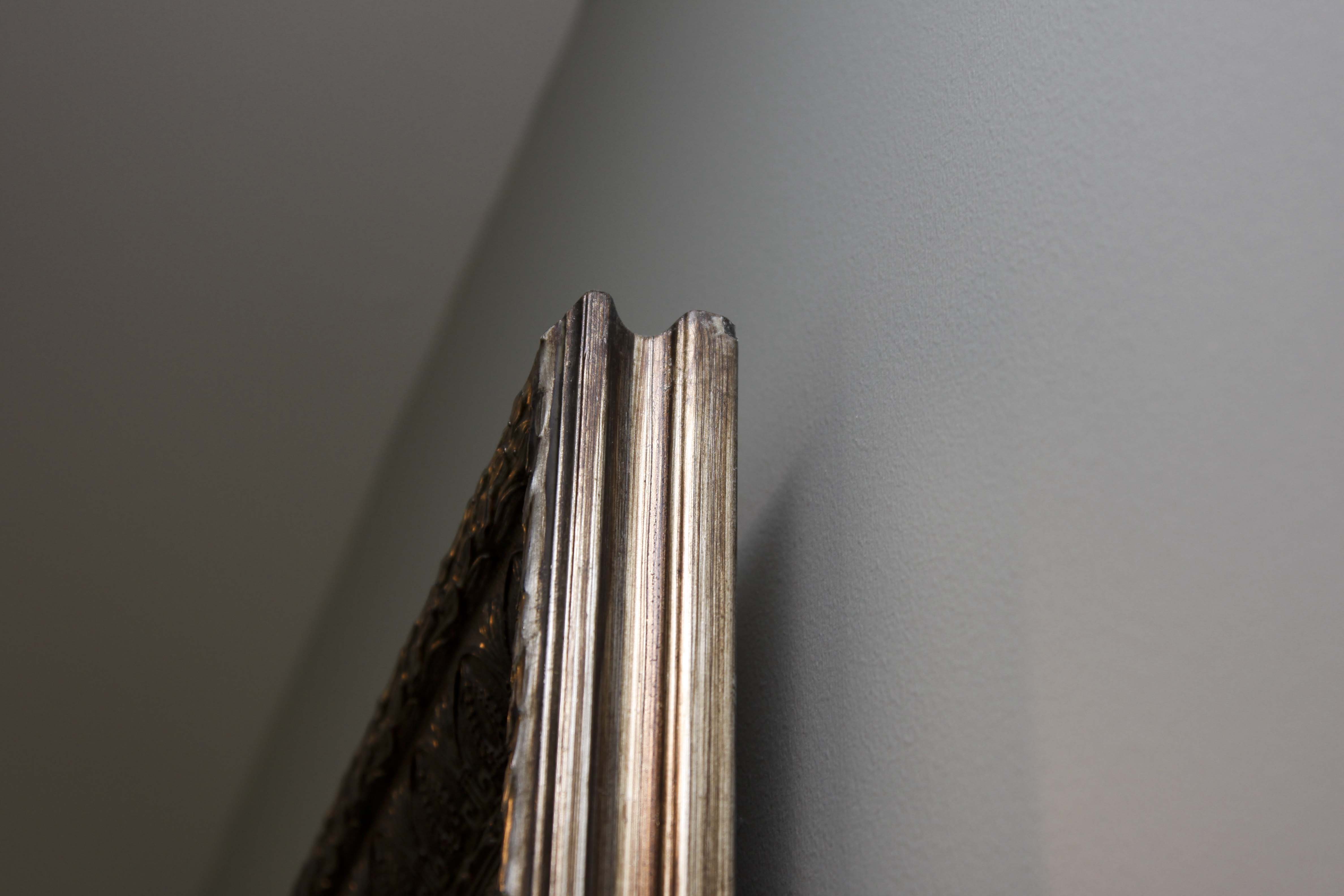 Ornately Framed Wall Mirror