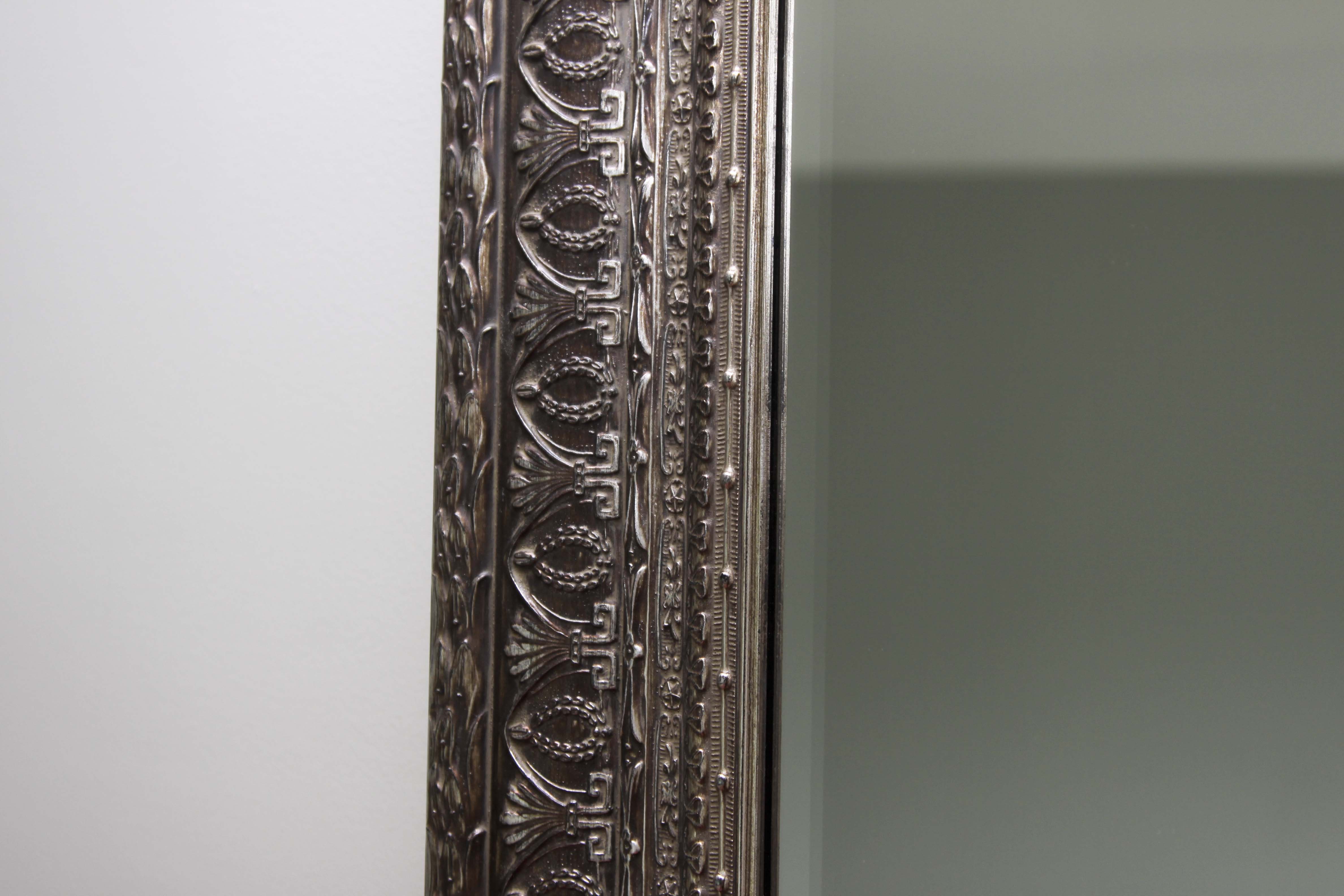 Ornately Framed Wall Mirror