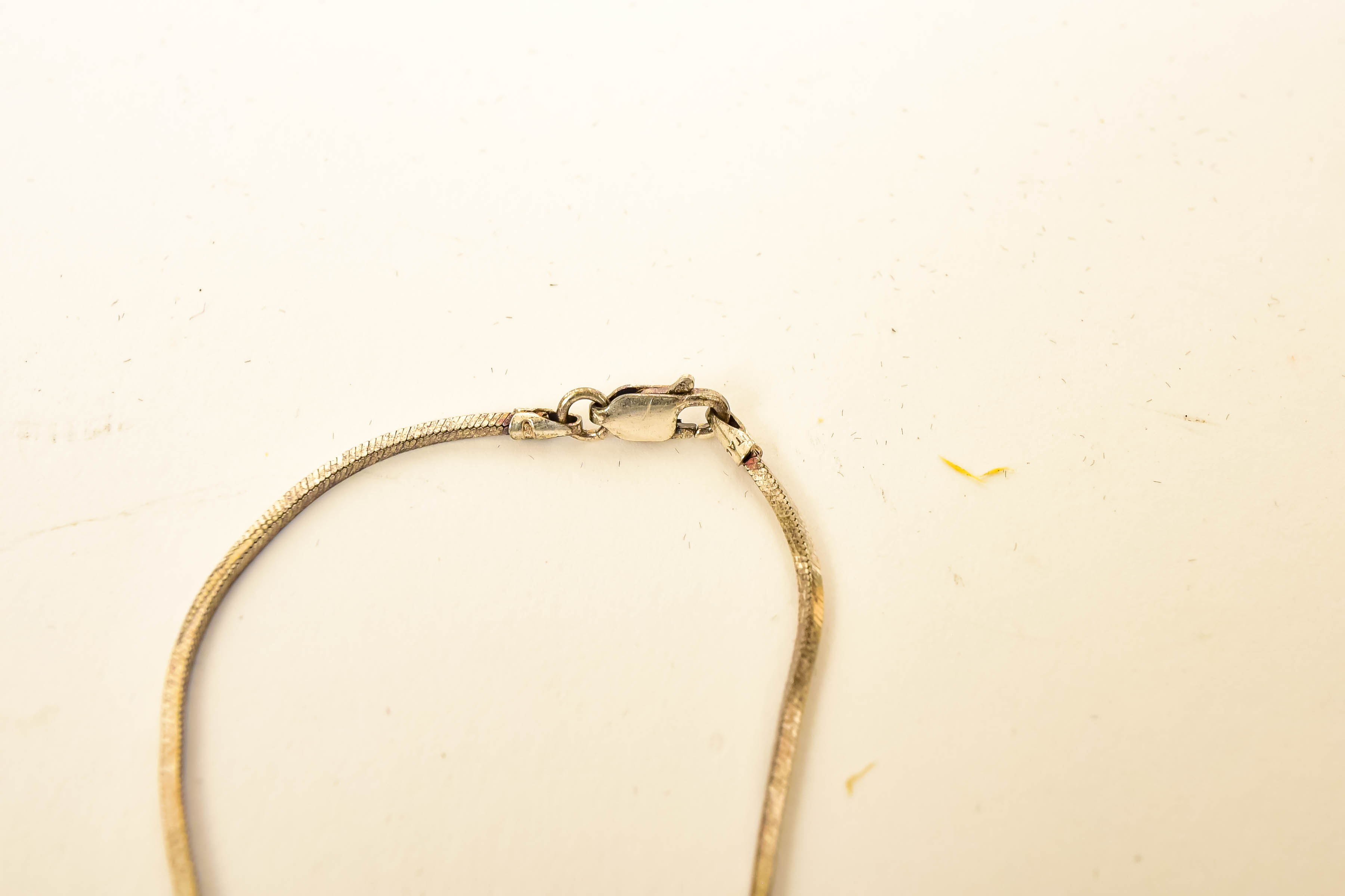 Pair of Silver Charm Necklaces