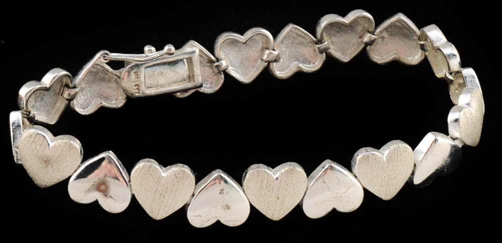 Group of Five Silver Bracelets