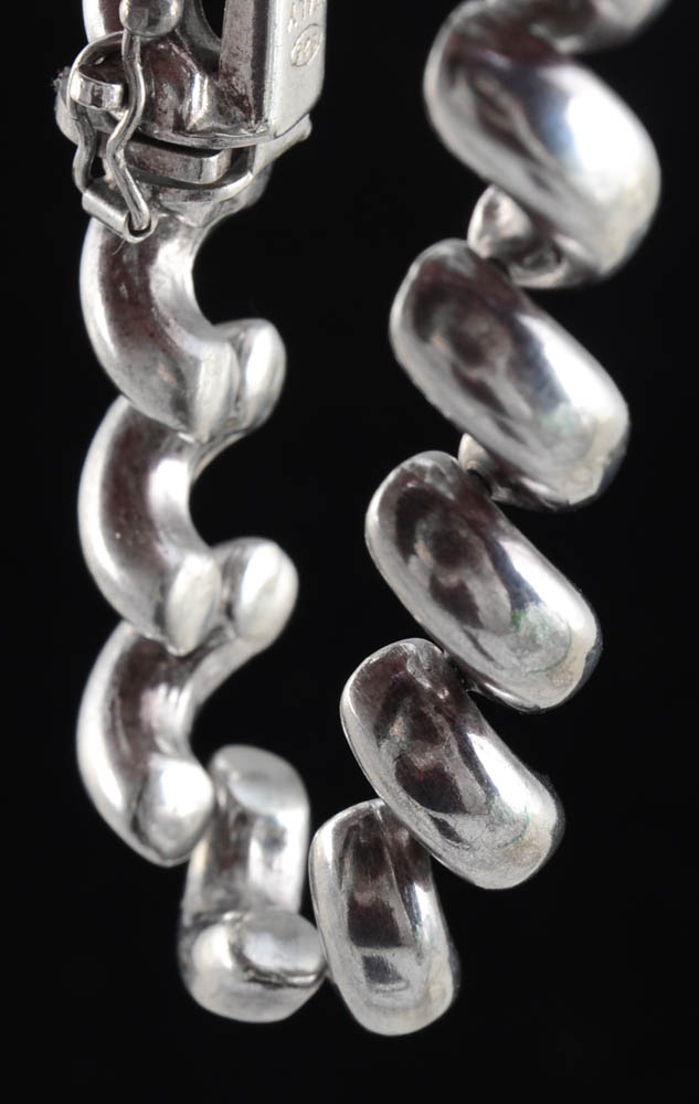 Group of Five Silver Bracelets