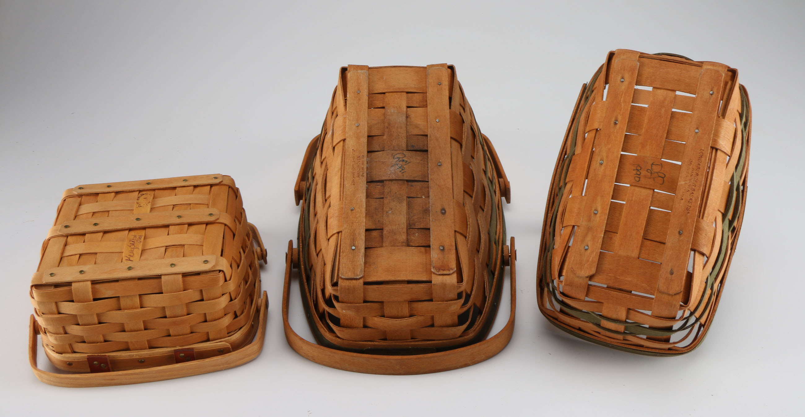 A Collection of Five 1990s Longaberger Handwoven Baskets