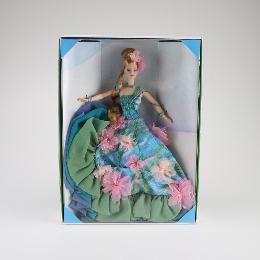Claude Monet "Water Lily" Barbie and Porcelain Holiday Caroler Barbie Doll Pairing