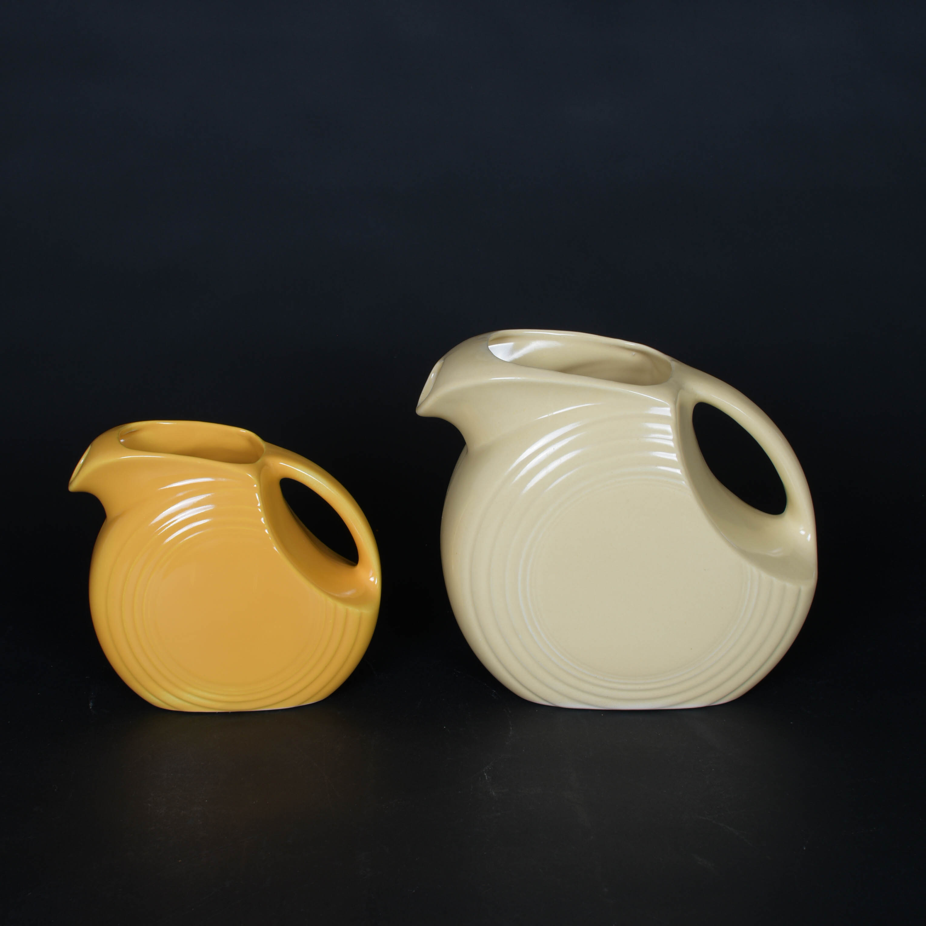 Two Fiesta Disc Pitchers