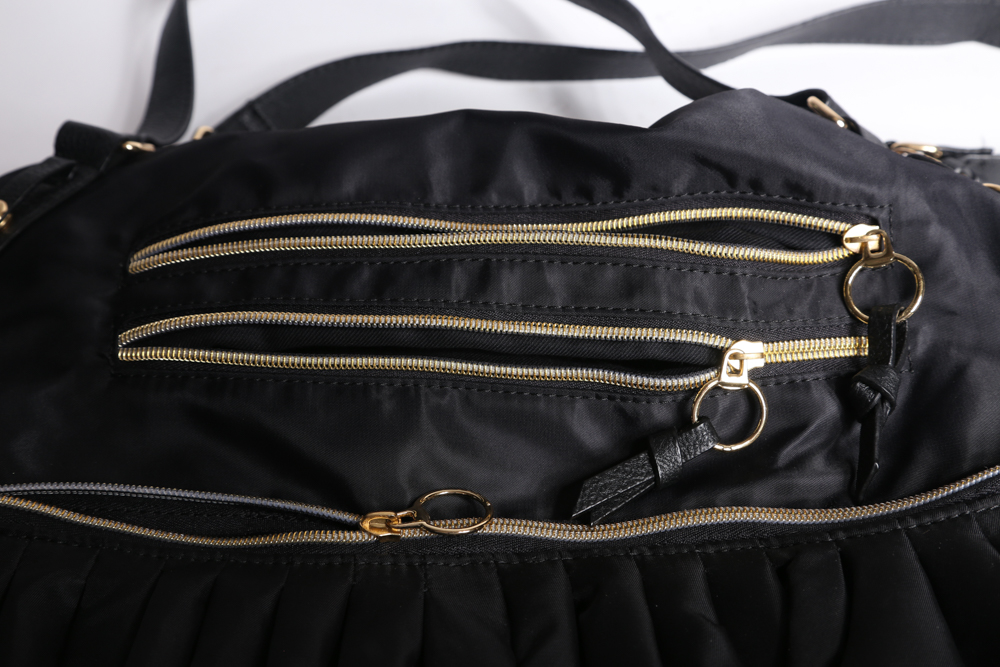 Group of Duffle Bags and Purses