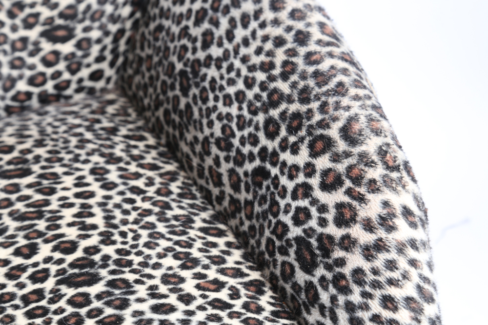 Mini Couch with Leopard Print Upholstery and Two Pillows