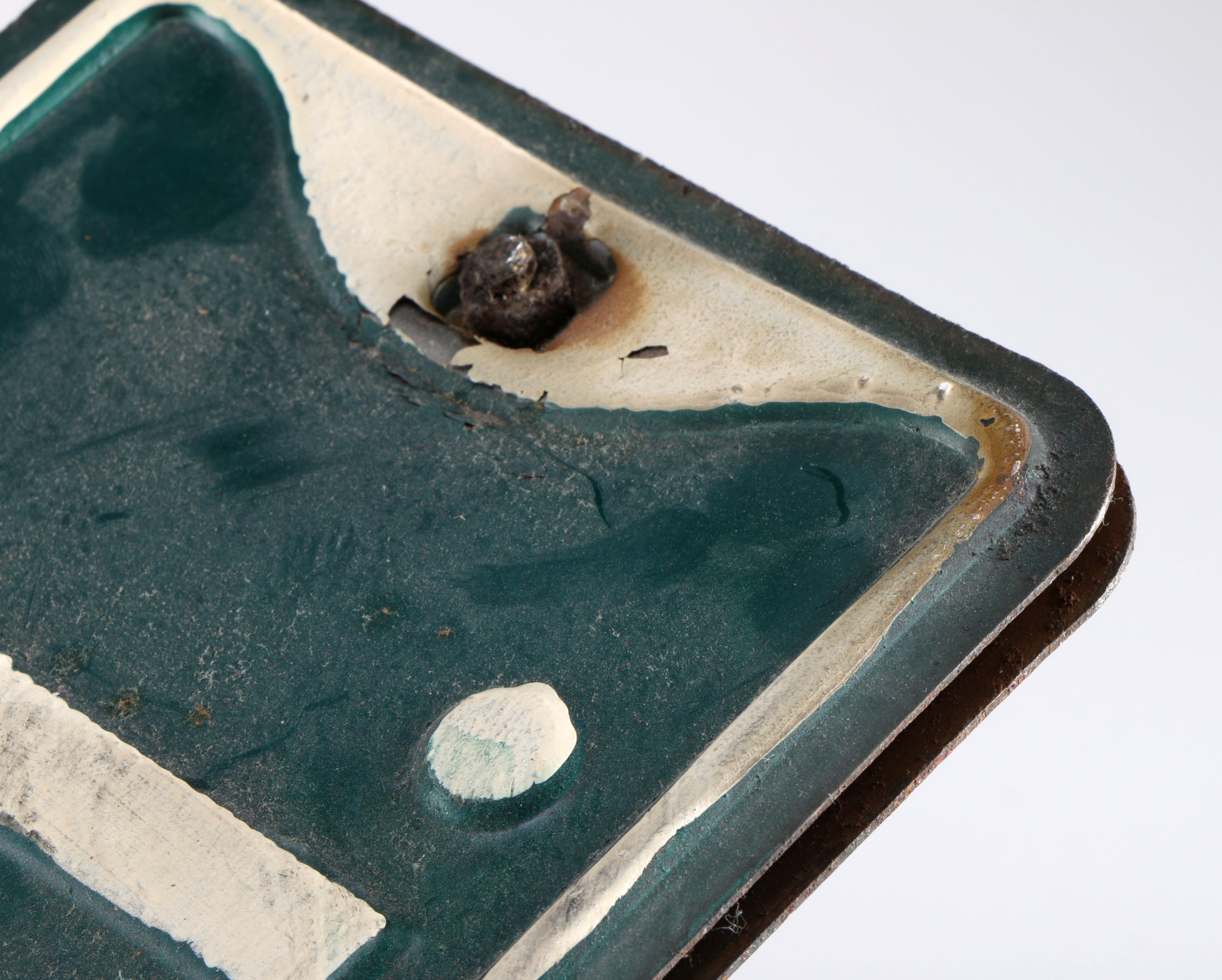 A Vintage Green and White Street Sign