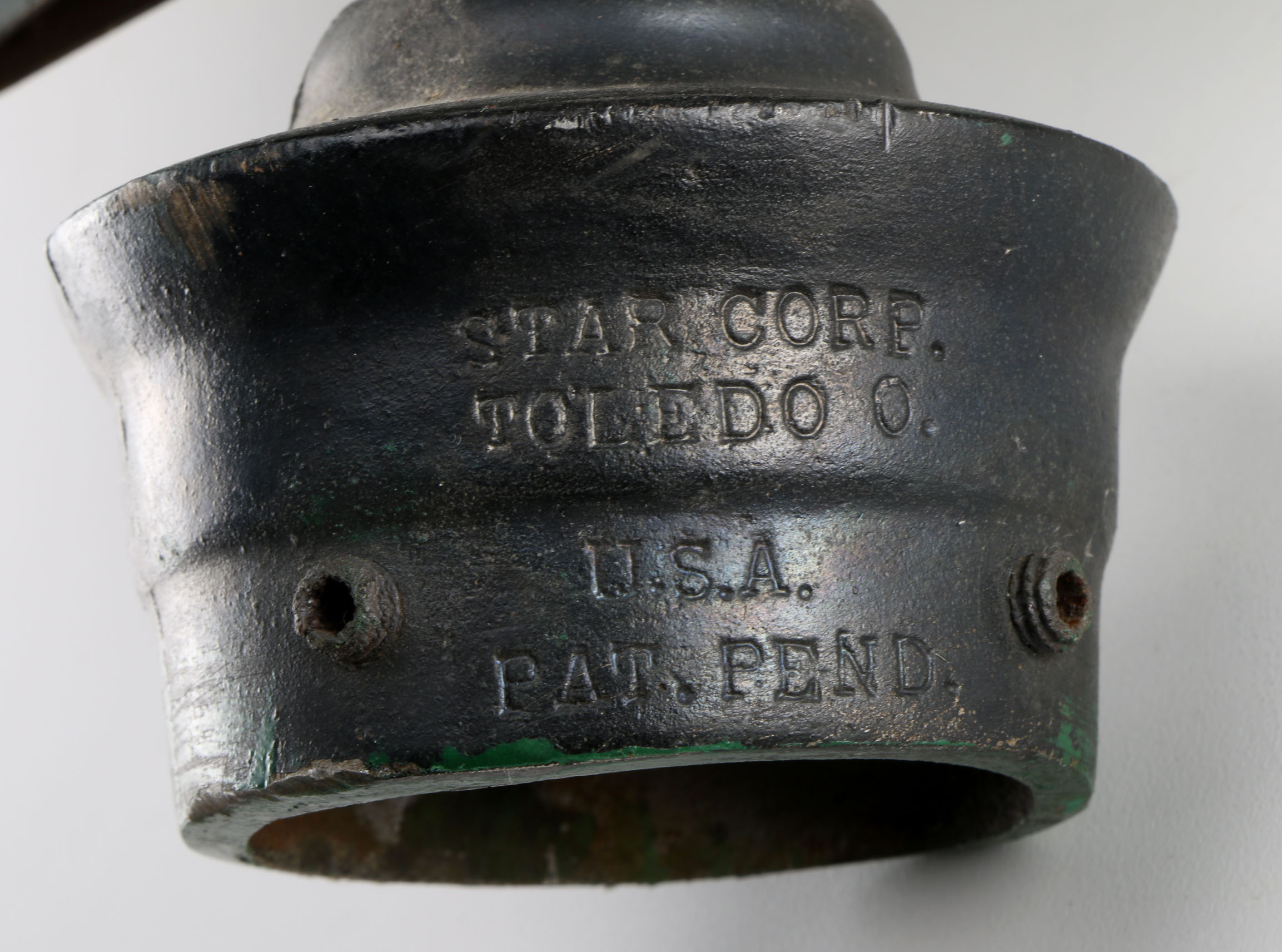 A Vintage Green and White Street Sign