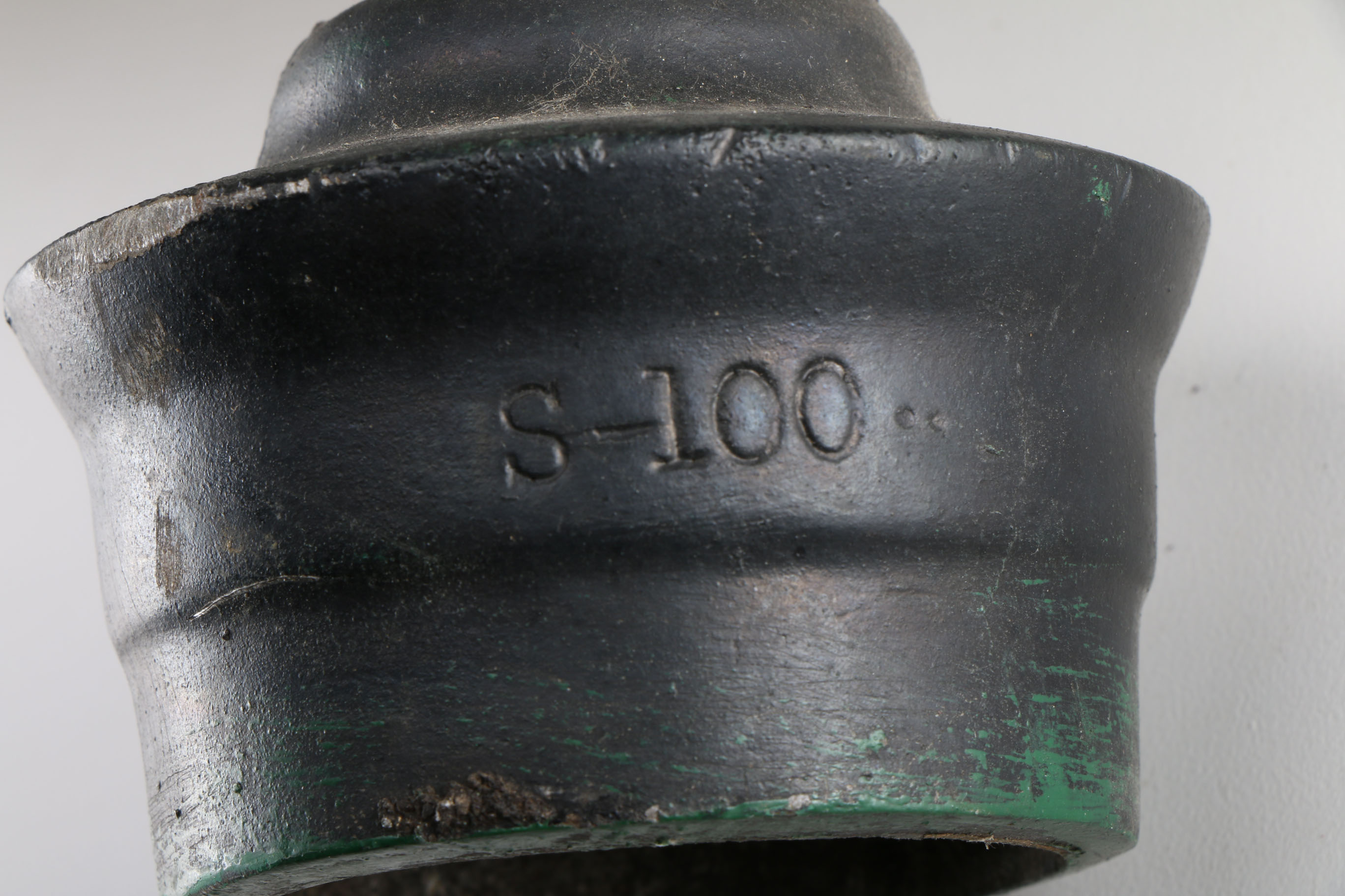 A Vintage Green and White Street Sign