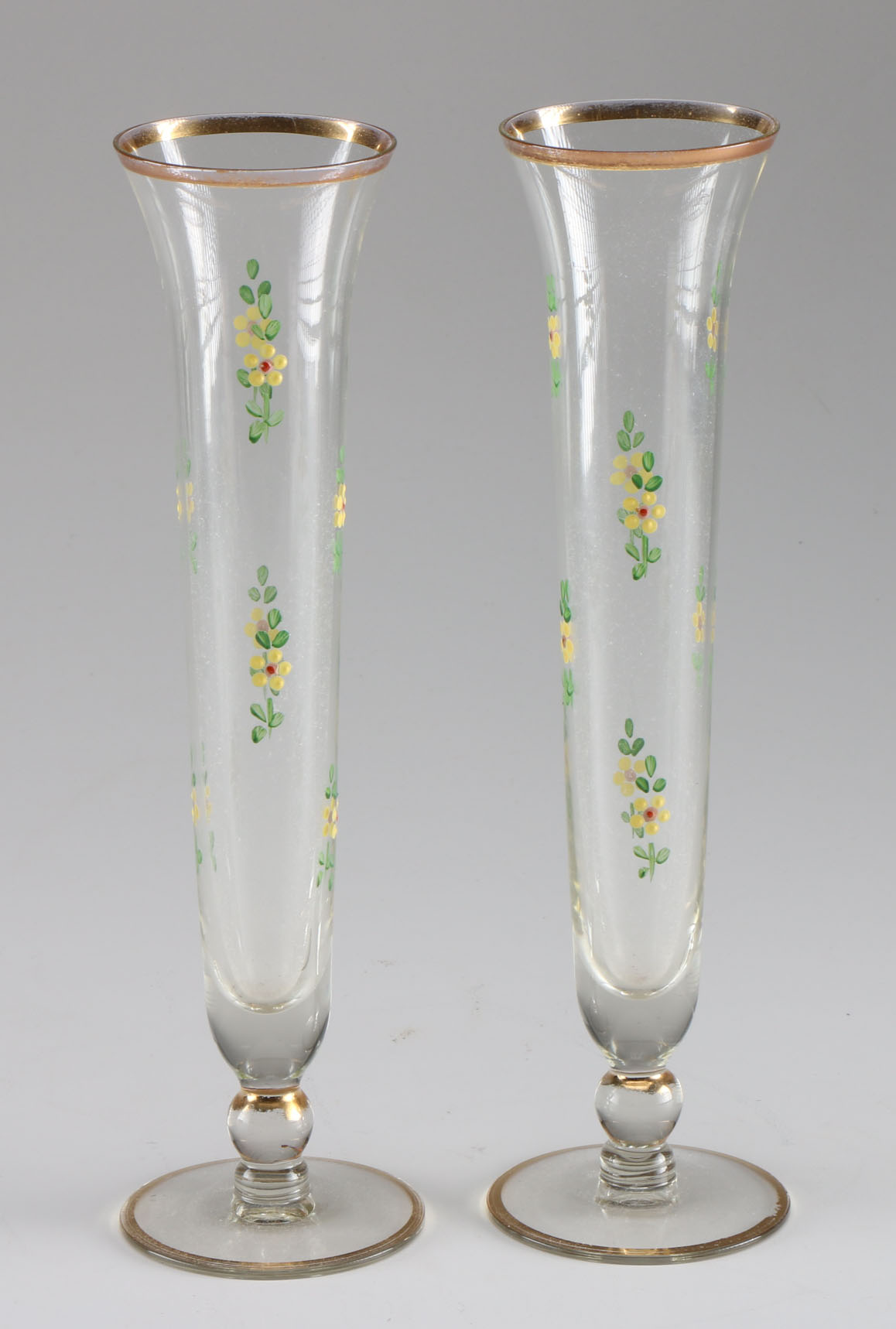 Two Sets of Decorative Bud Glass Vases