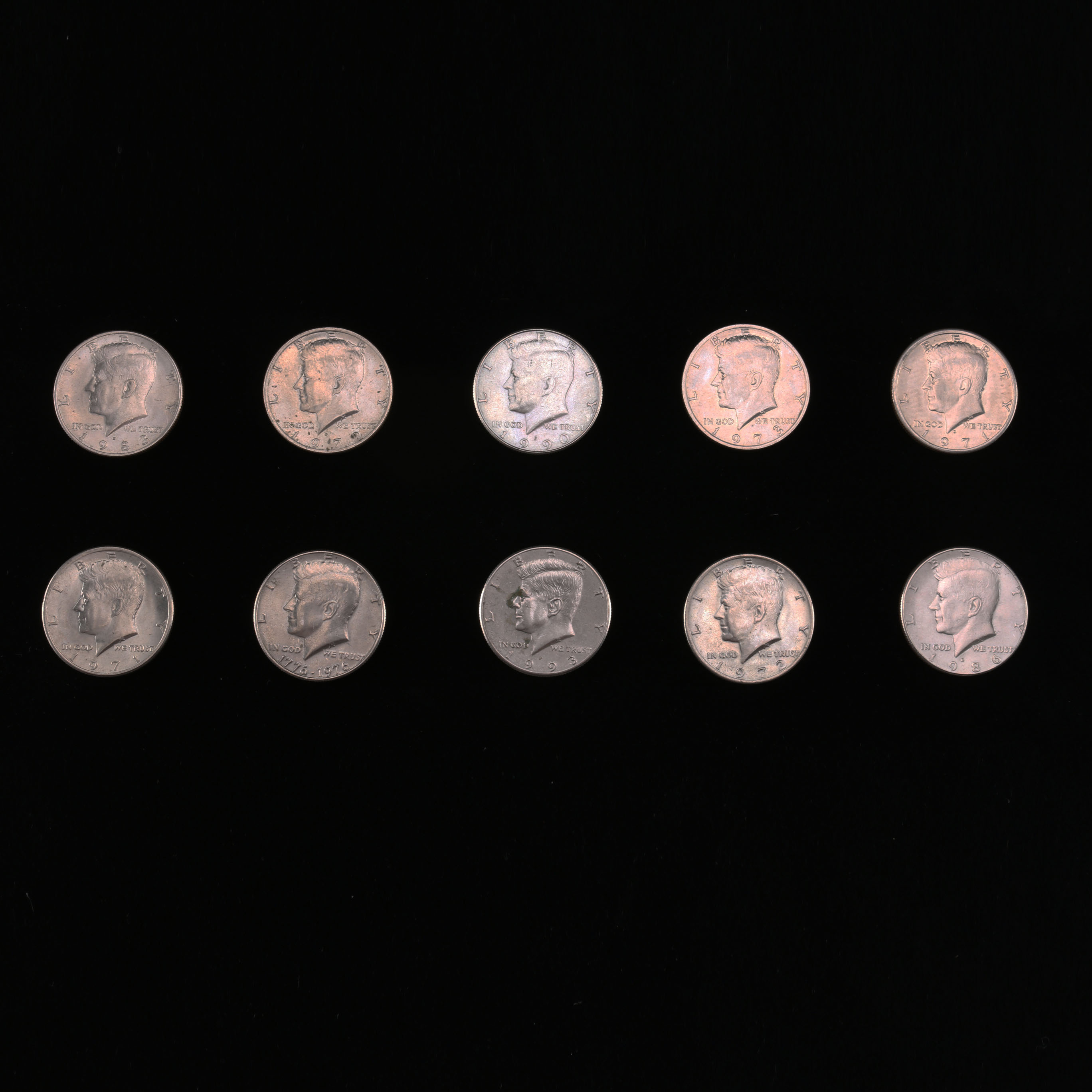 A Collection of Ten Kennedy Half Dollars