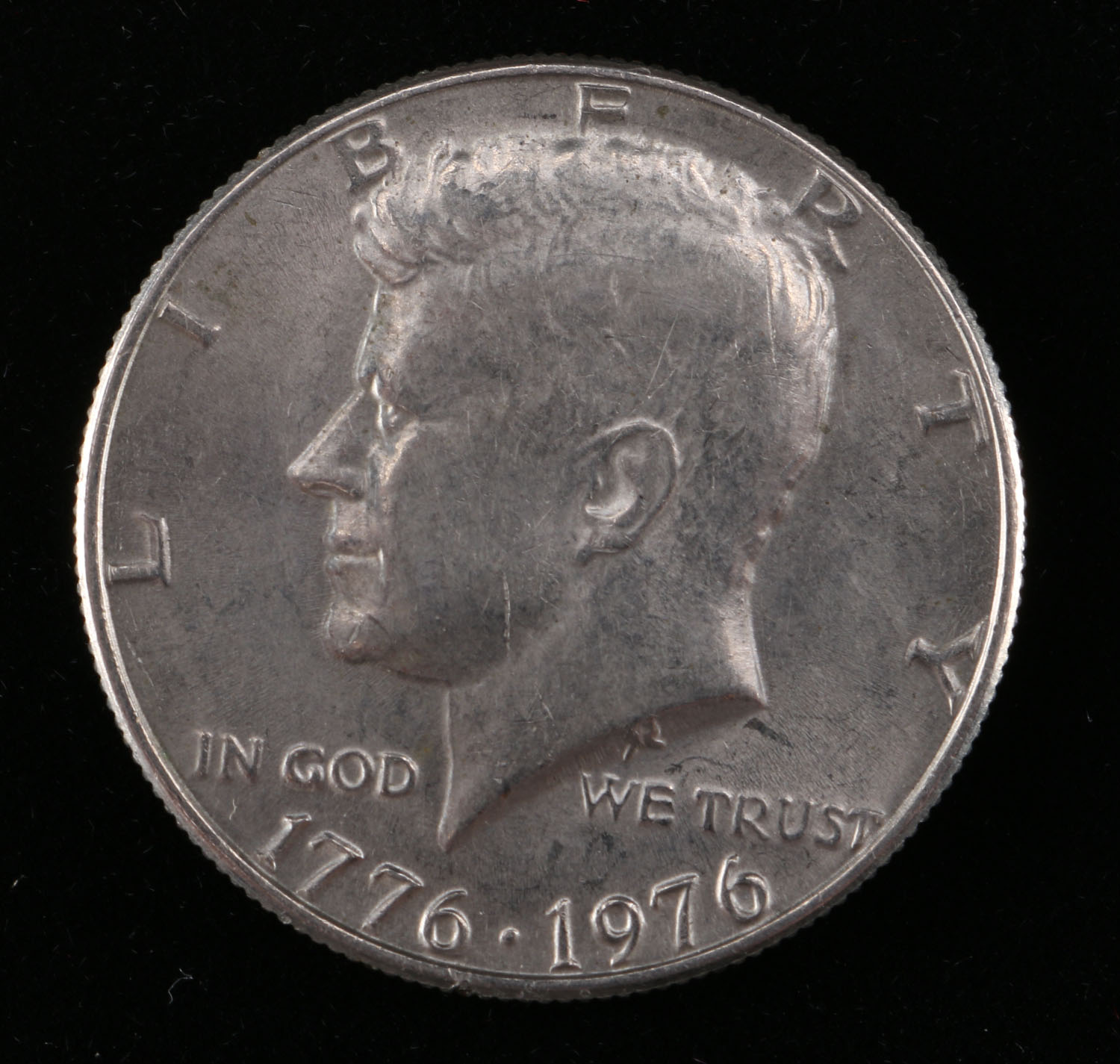 A Collection of Ten Kennedy Half Dollars