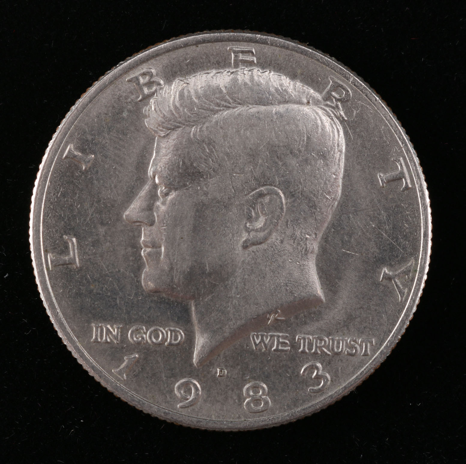 A Collection of Ten Kennedy Half Dollars