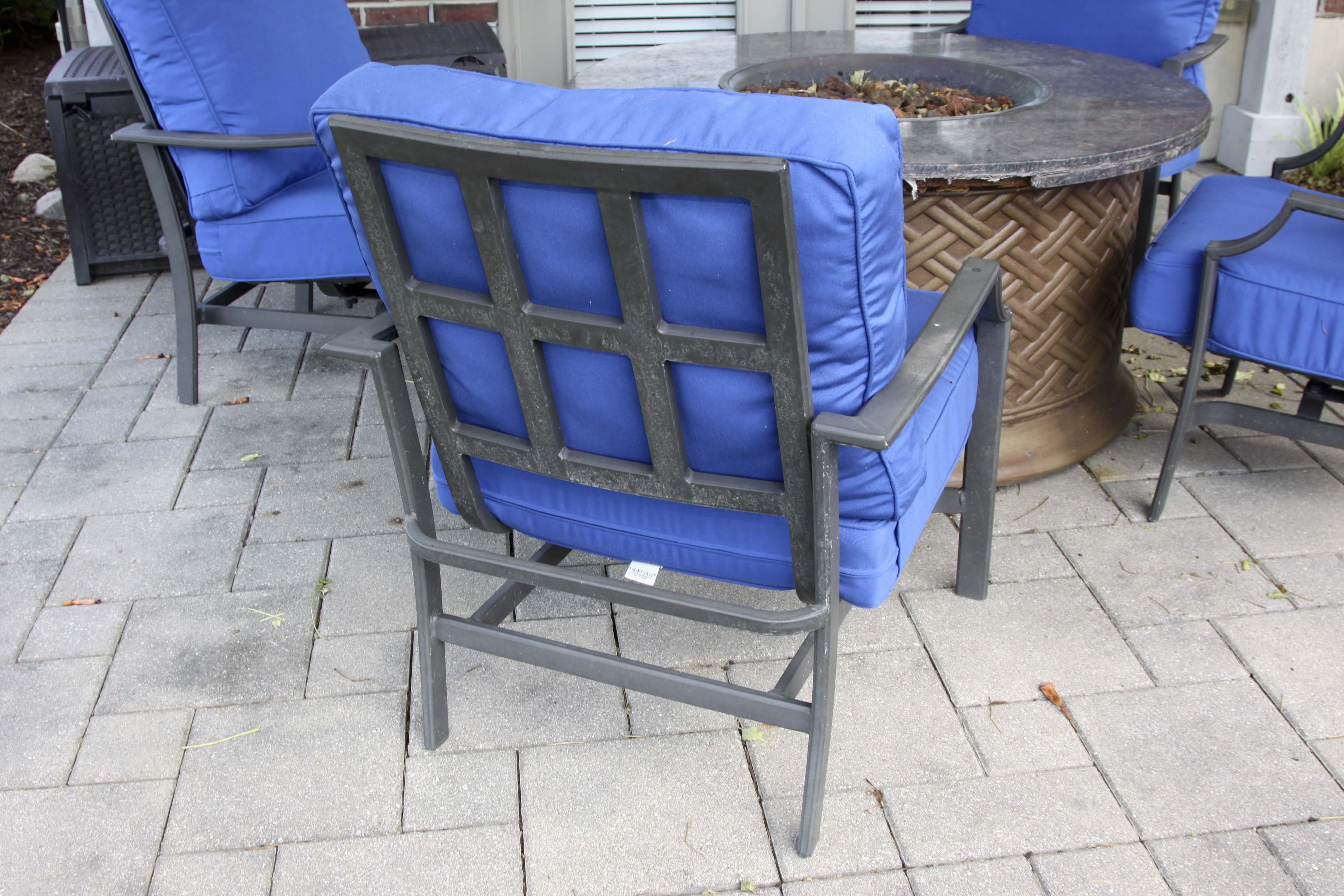 Four Frontgate Patio Chairs with Royal Blue Cushions