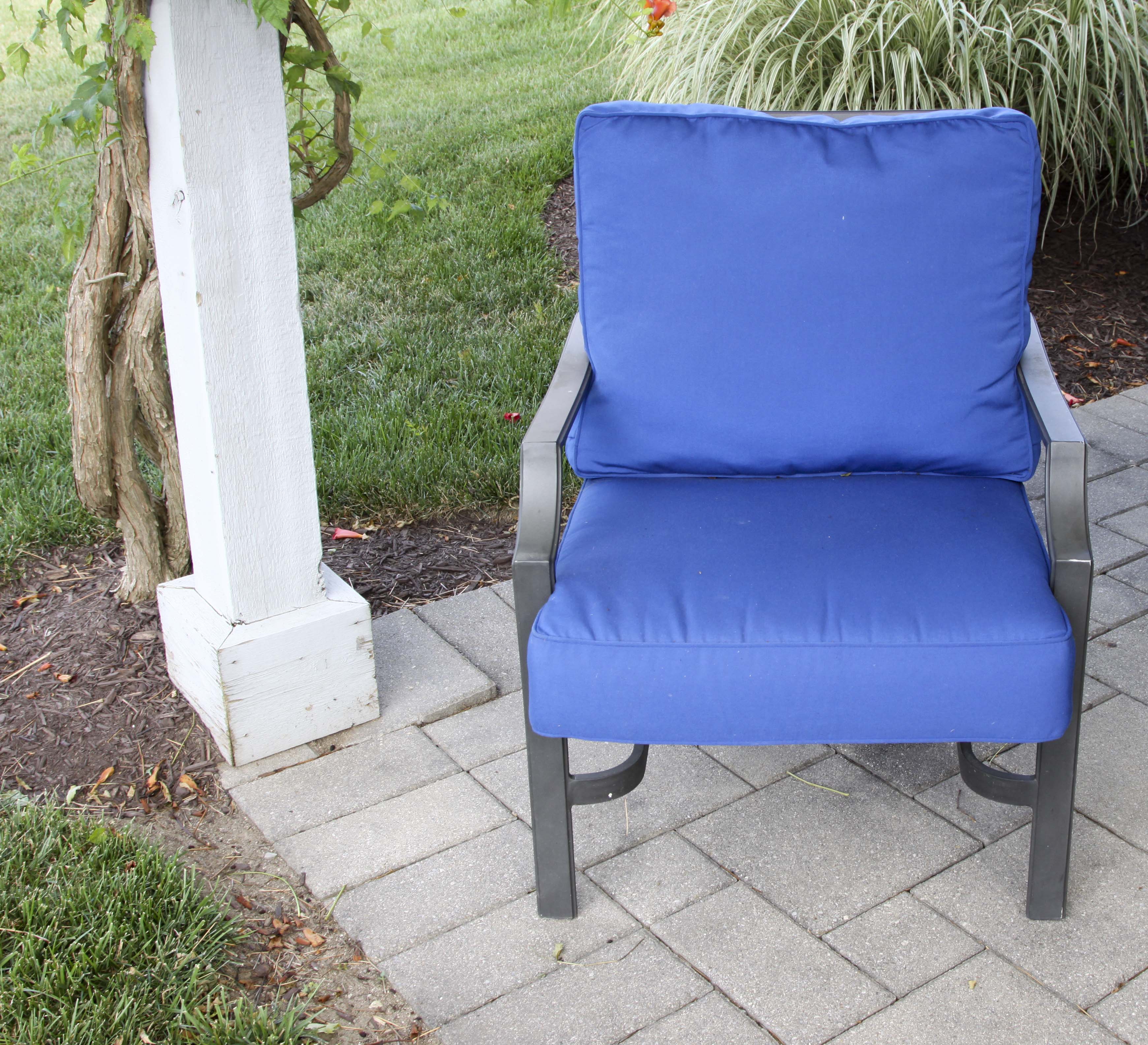 Four Frontgate Patio Chairs with Royal Blue Cushions