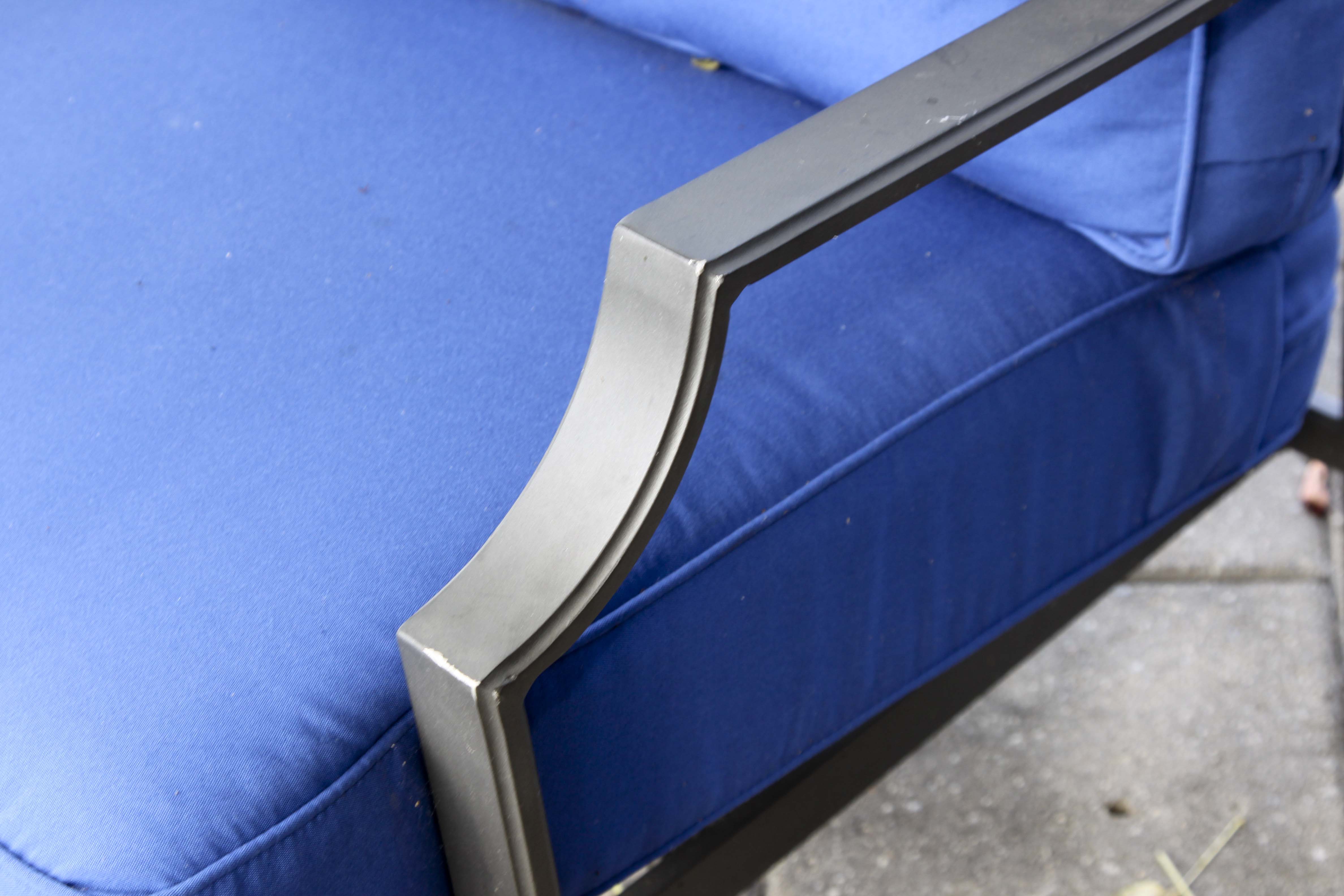 Four Frontgate Patio Chairs with Royal Blue Cushions