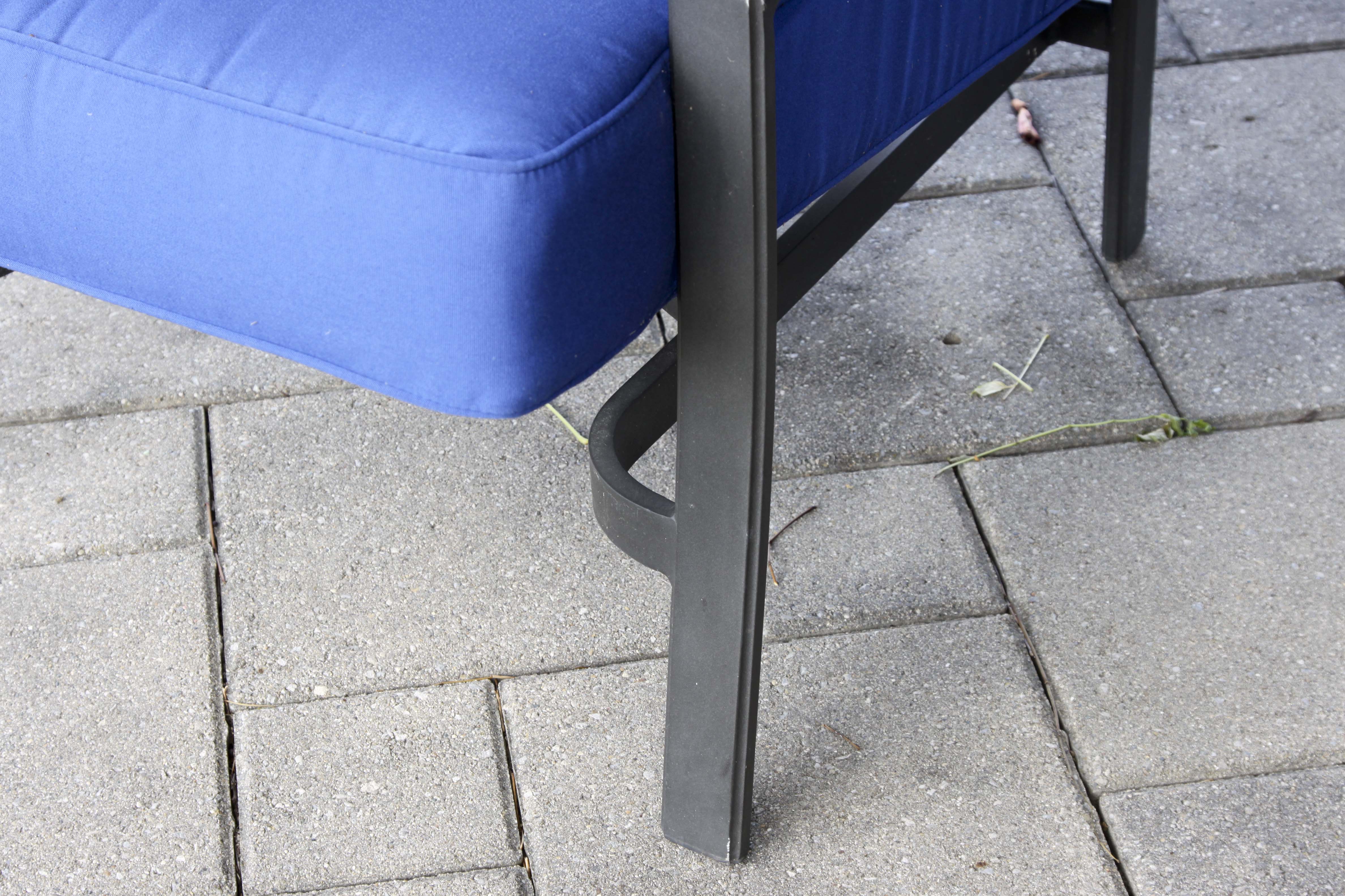 Four Frontgate Patio Chairs with Royal Blue Cushions