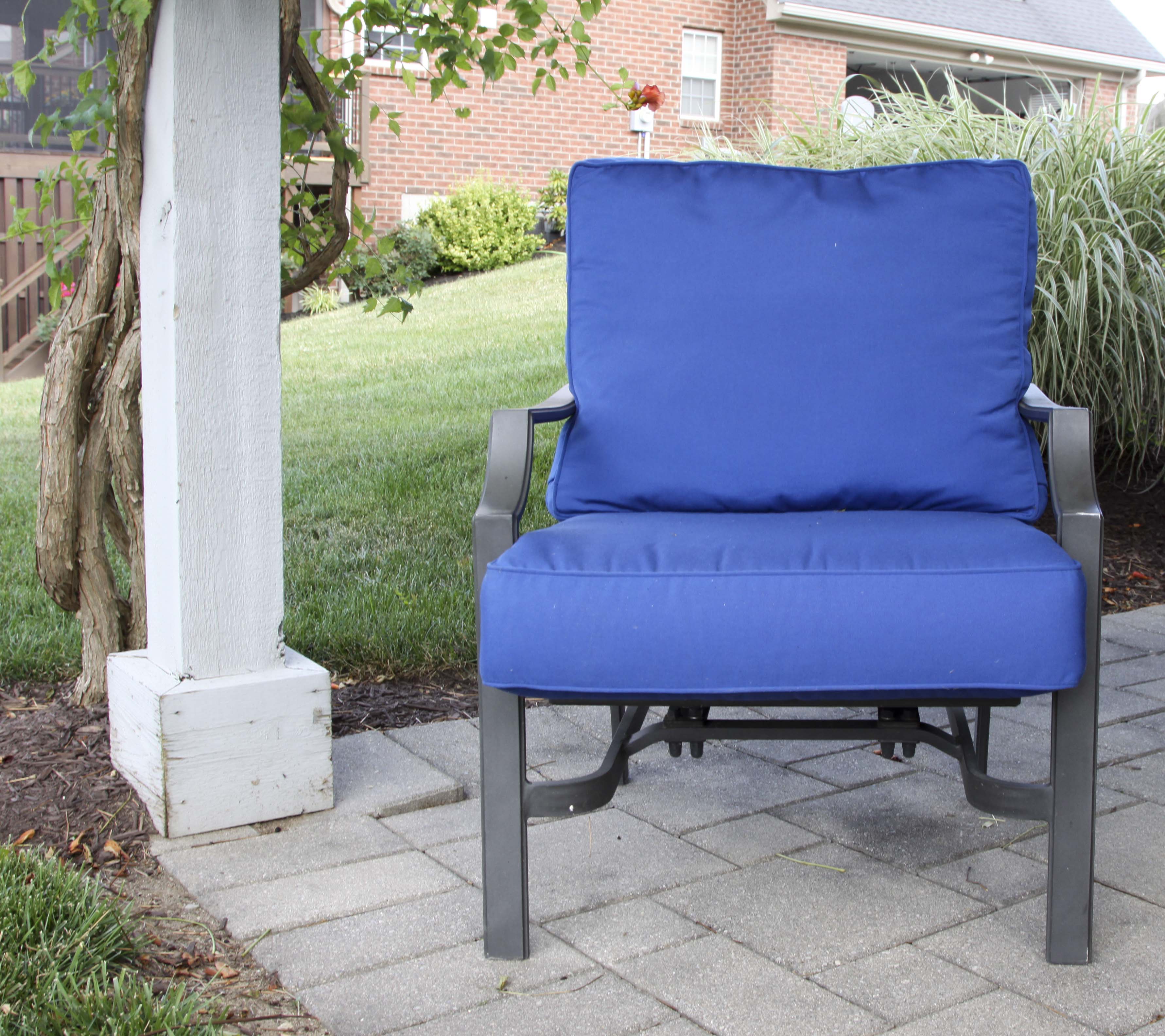 Four Frontgate Patio Chairs with Royal Blue Cushions