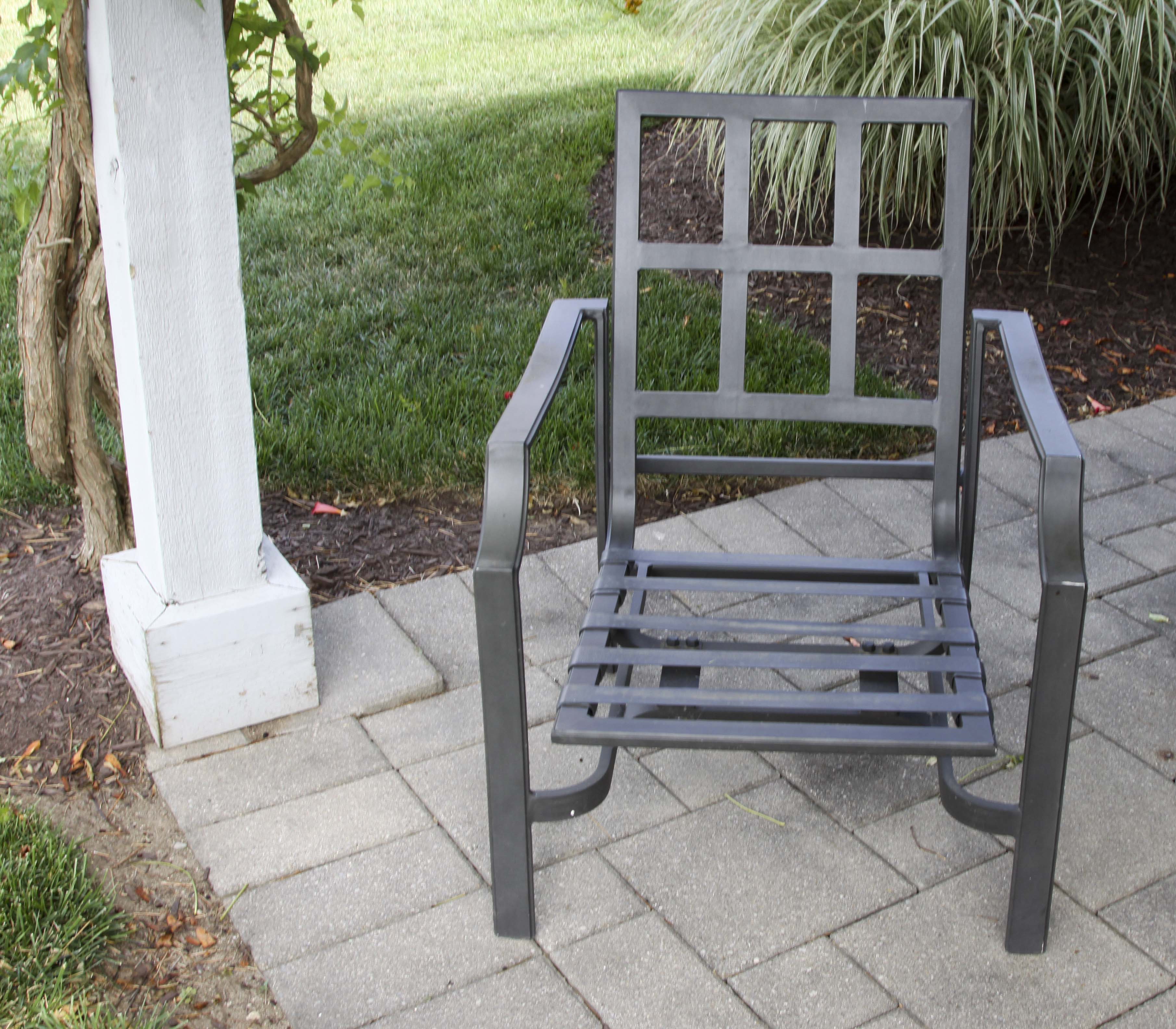 Four Frontgate Patio Chairs with Royal Blue Cushions