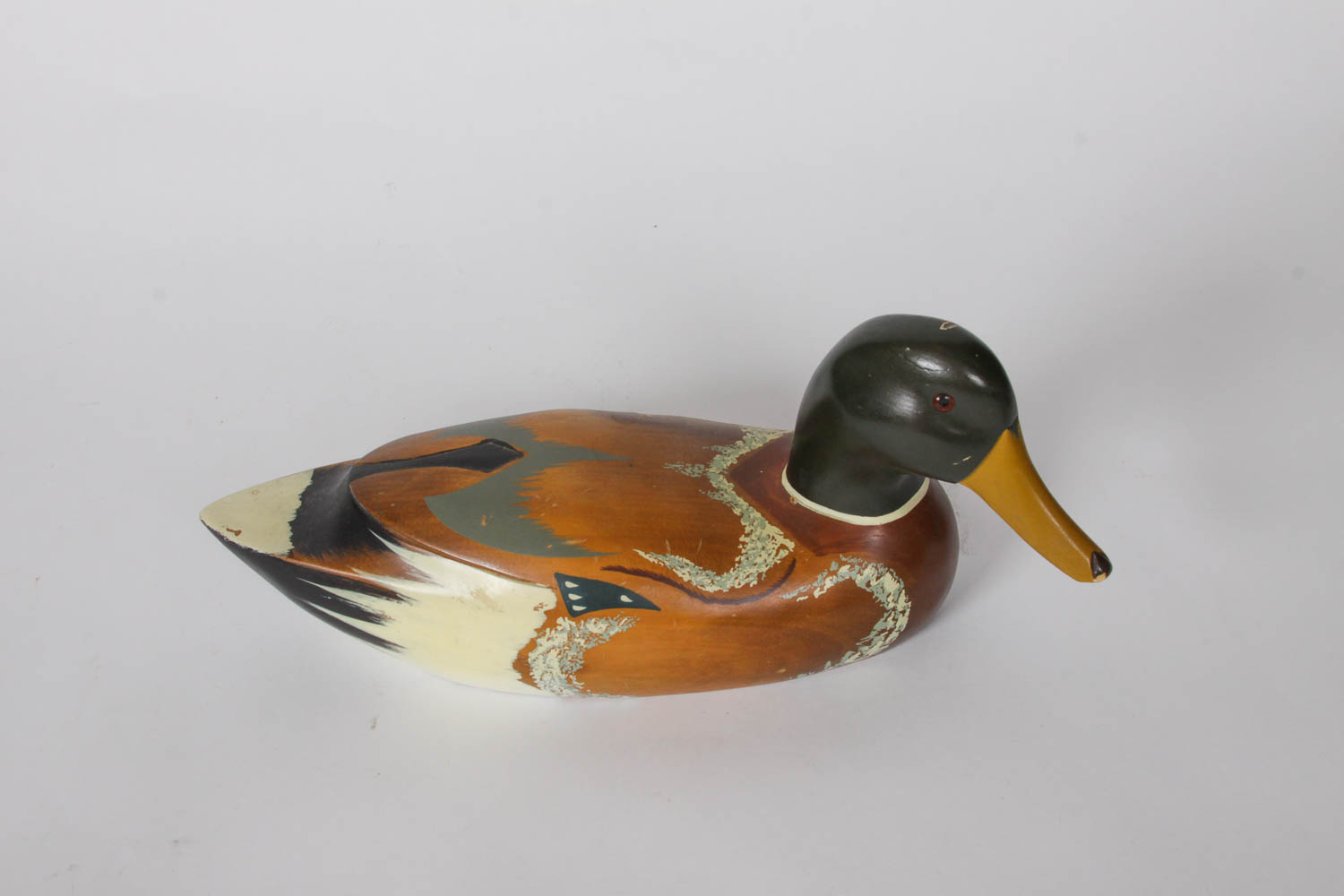 Collection of Carved Wooden Duck Figurines