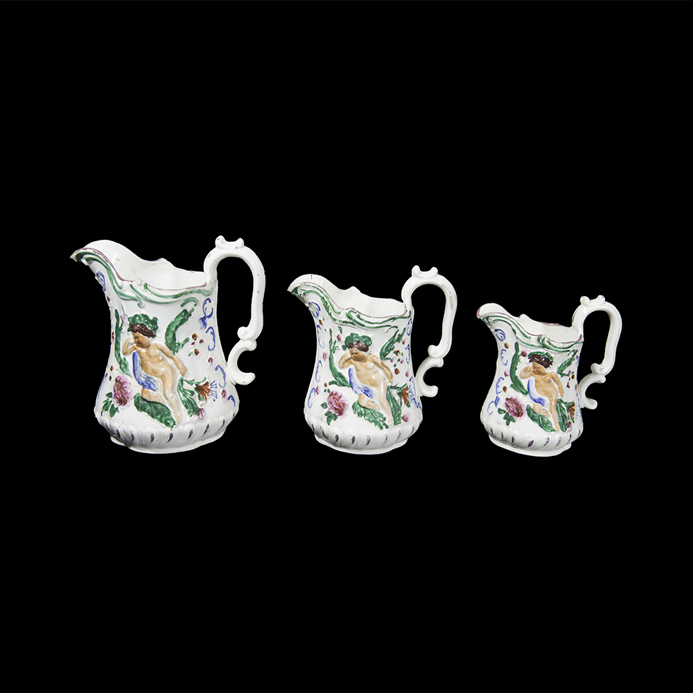 Graduated Staffordshire Hand-Painted Jugs