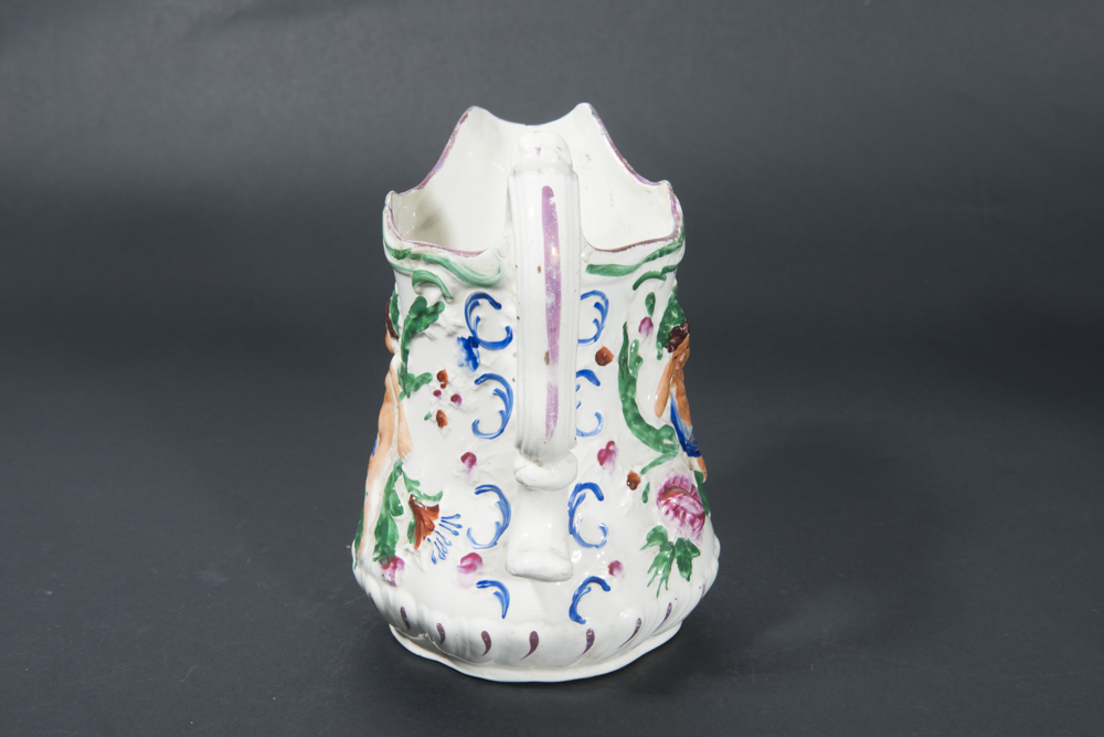 Graduated Staffordshire Hand-Painted Jugs