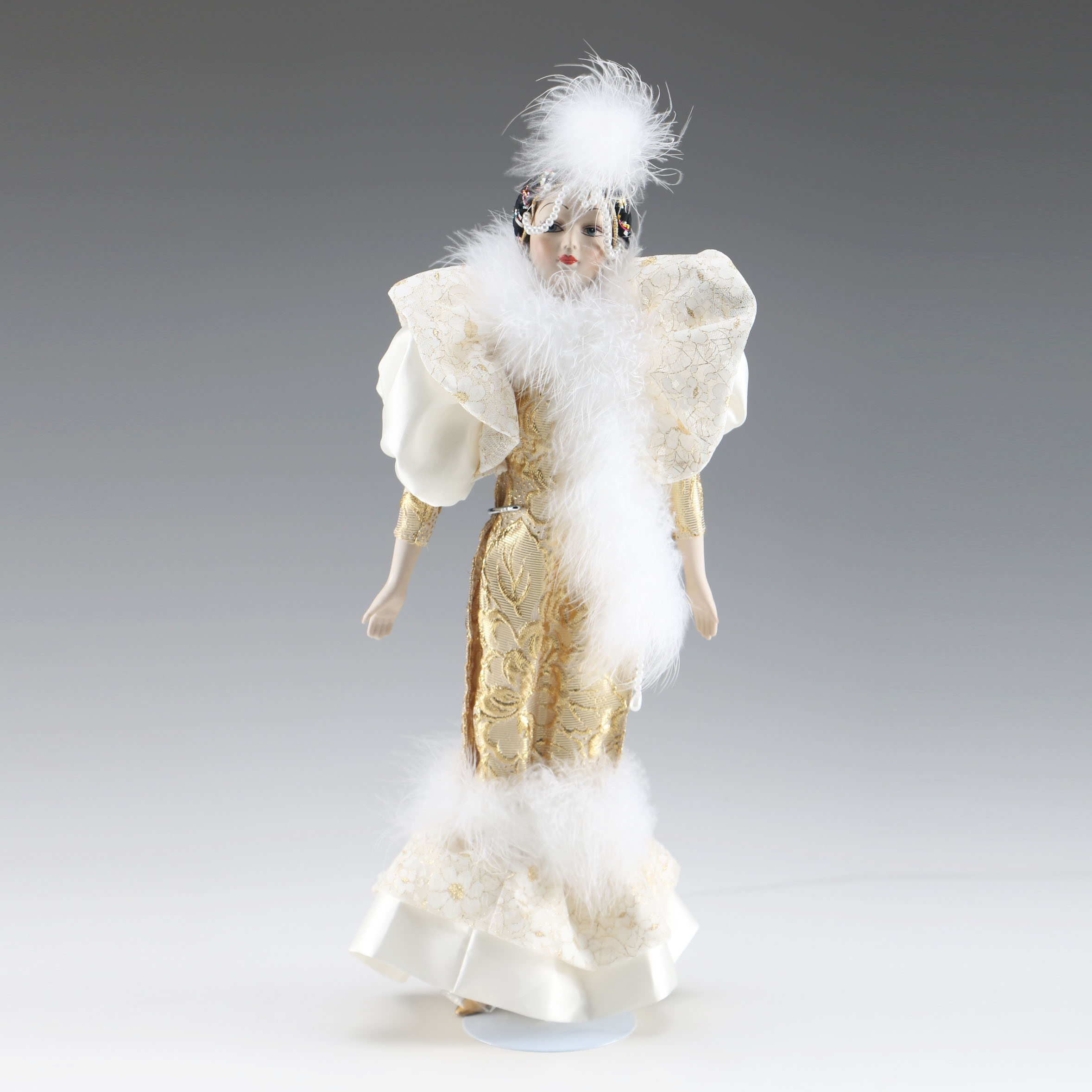 Enesco Porcelain Doll in Extravagant Gold Lame Outfit