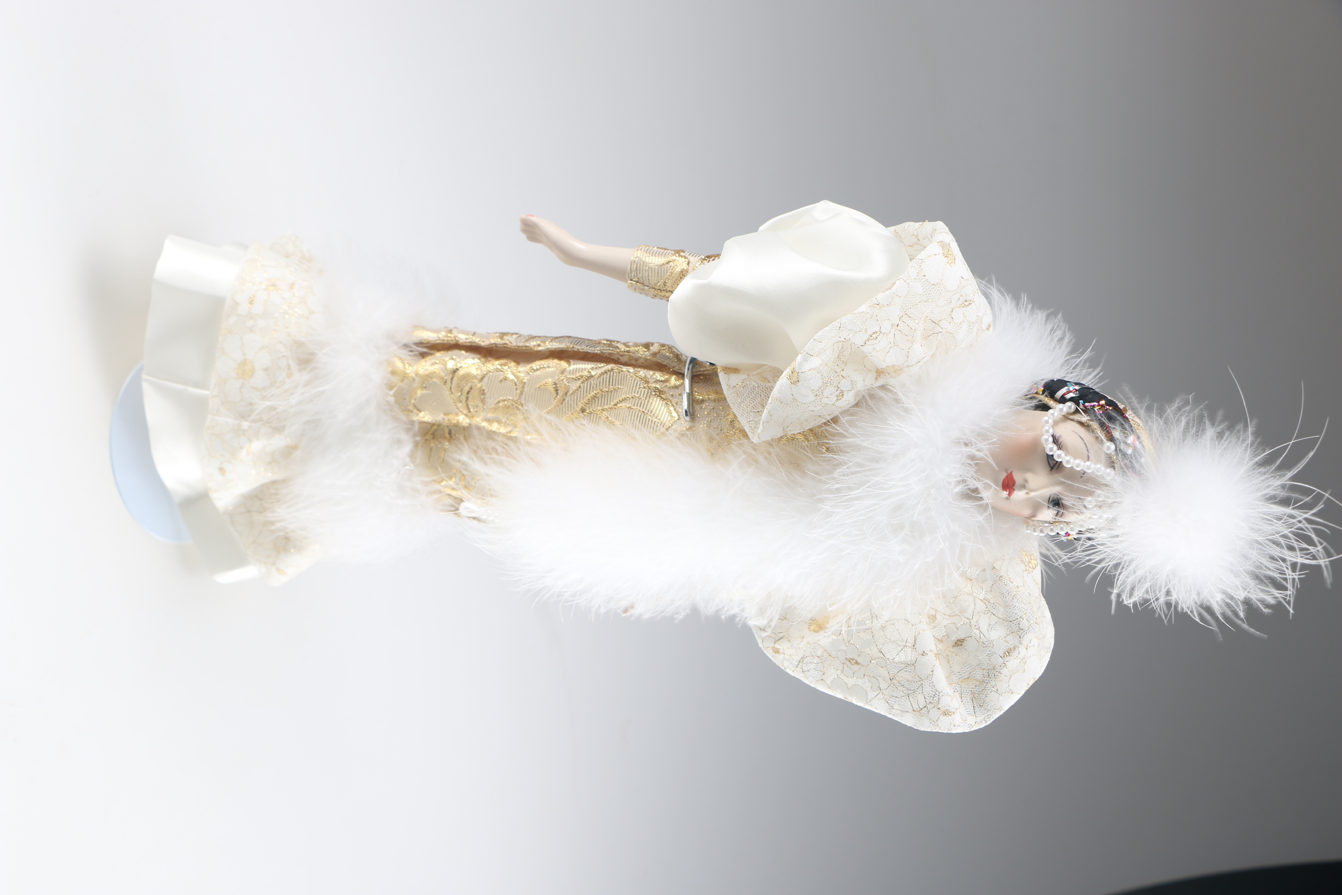 Enesco Porcelain Doll in Extravagant Gold Lame Outfit