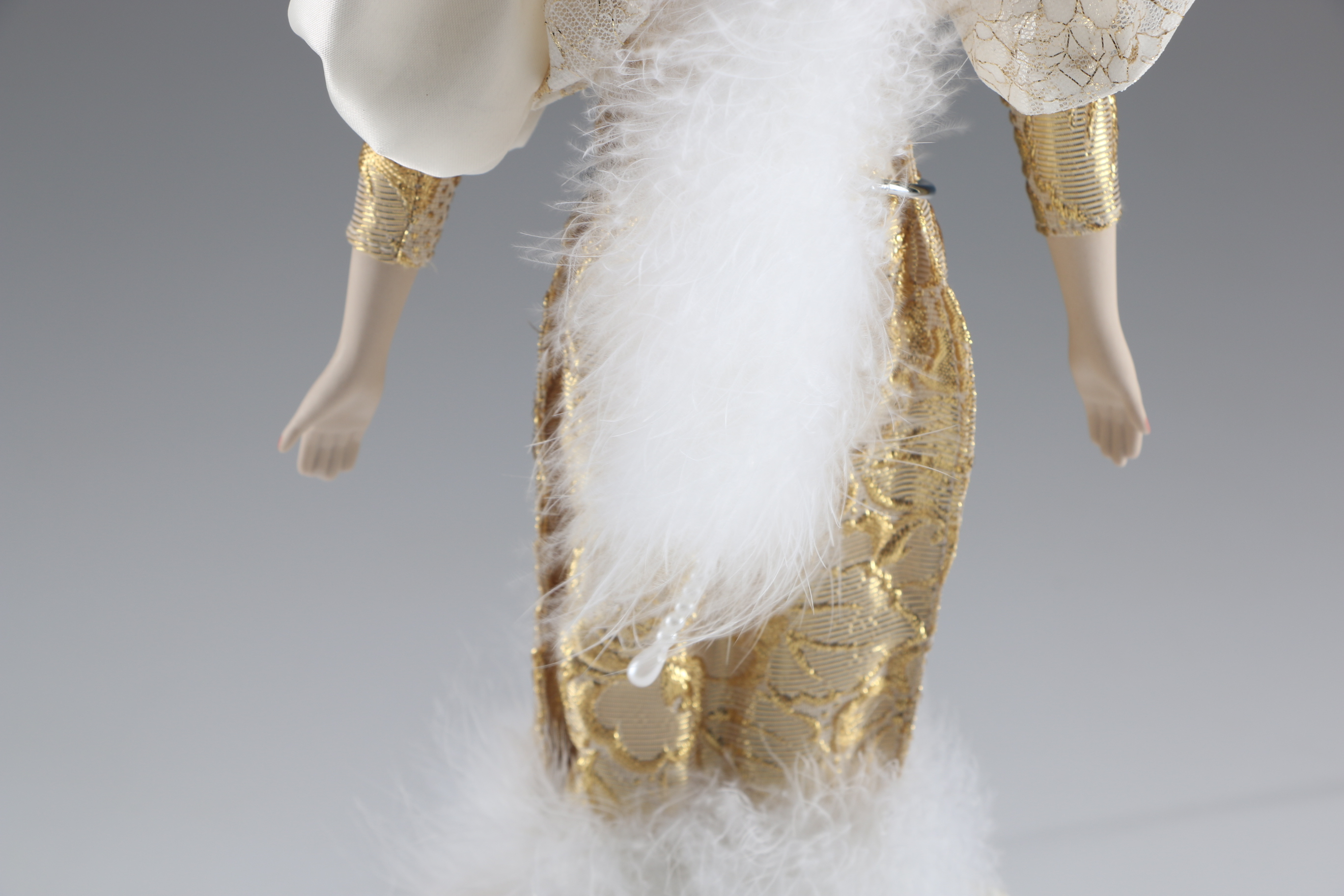 Enesco Porcelain Doll in Extravagant Gold Lame Outfit
