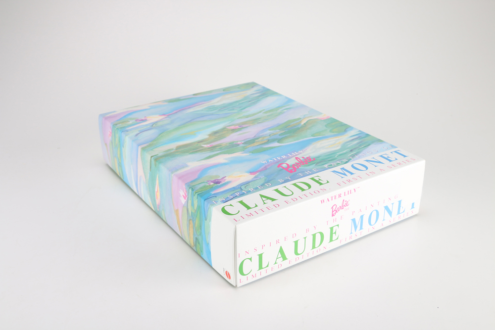 Claude Monet "Water Lily" Barbie and Porcelain Holiday Caroler Barbie Doll Pairing