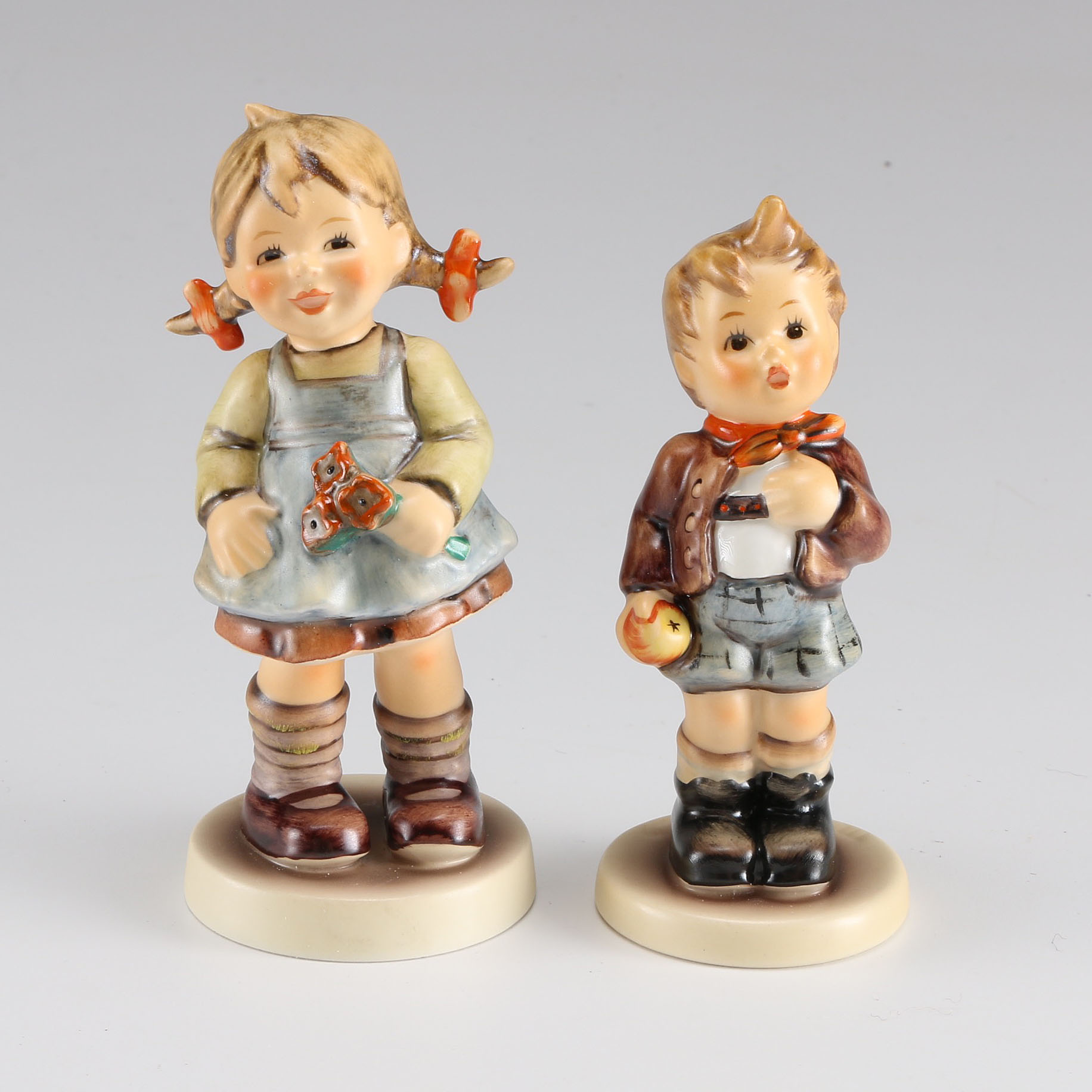 Hummel "Flower Girl" and "Cheeky Fellow" Figurines