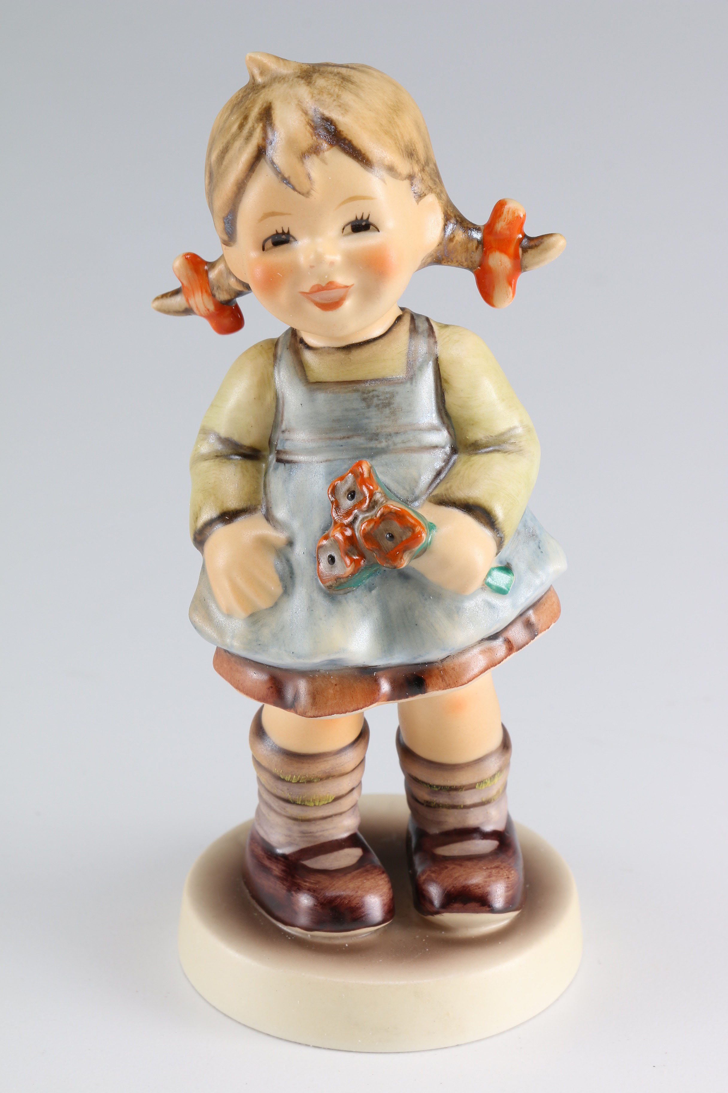 Hummel "Flower Girl" and "Cheeky Fellow" Figurines