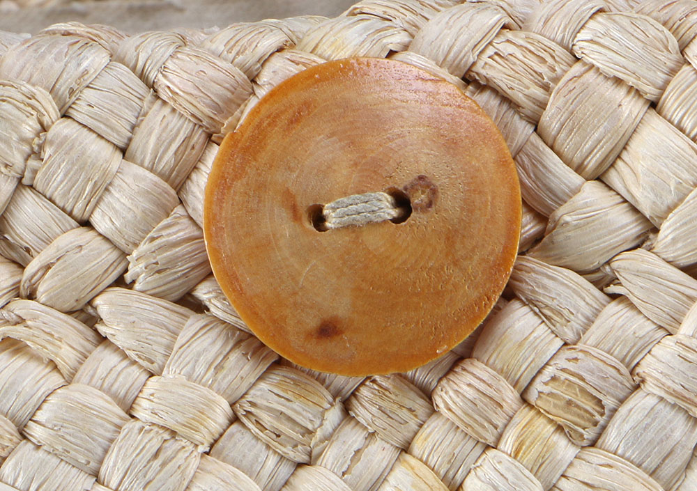 Six Straw Purses and One Straw Hat