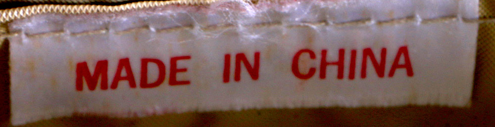 Six Straw Purses and One Straw Hat