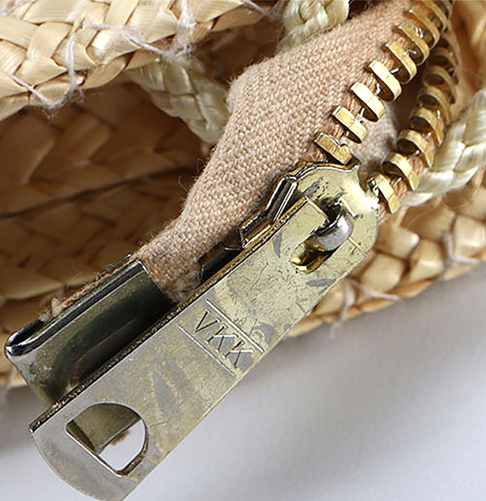 Six Straw Purses and One Straw Hat