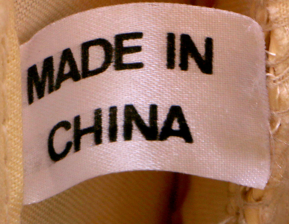 Six Straw Purses and One Straw Hat