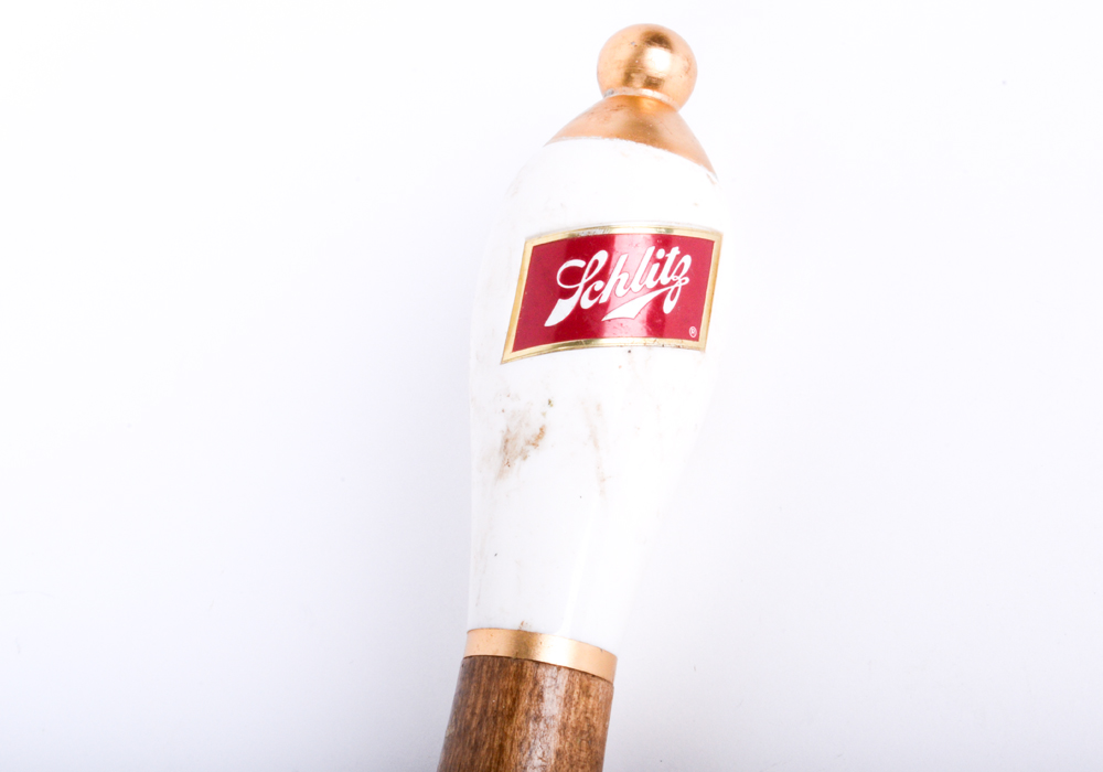 Collection of Beer Tap Handles and Decor