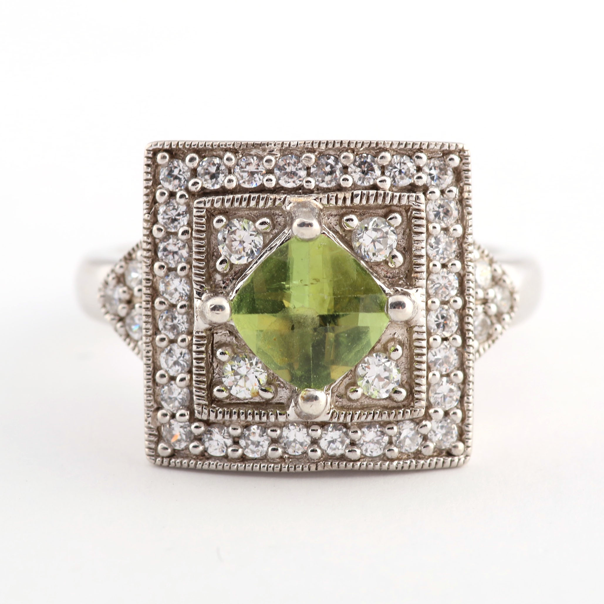 Sterling and Peridot Ring in Cubic Zirconia Setting