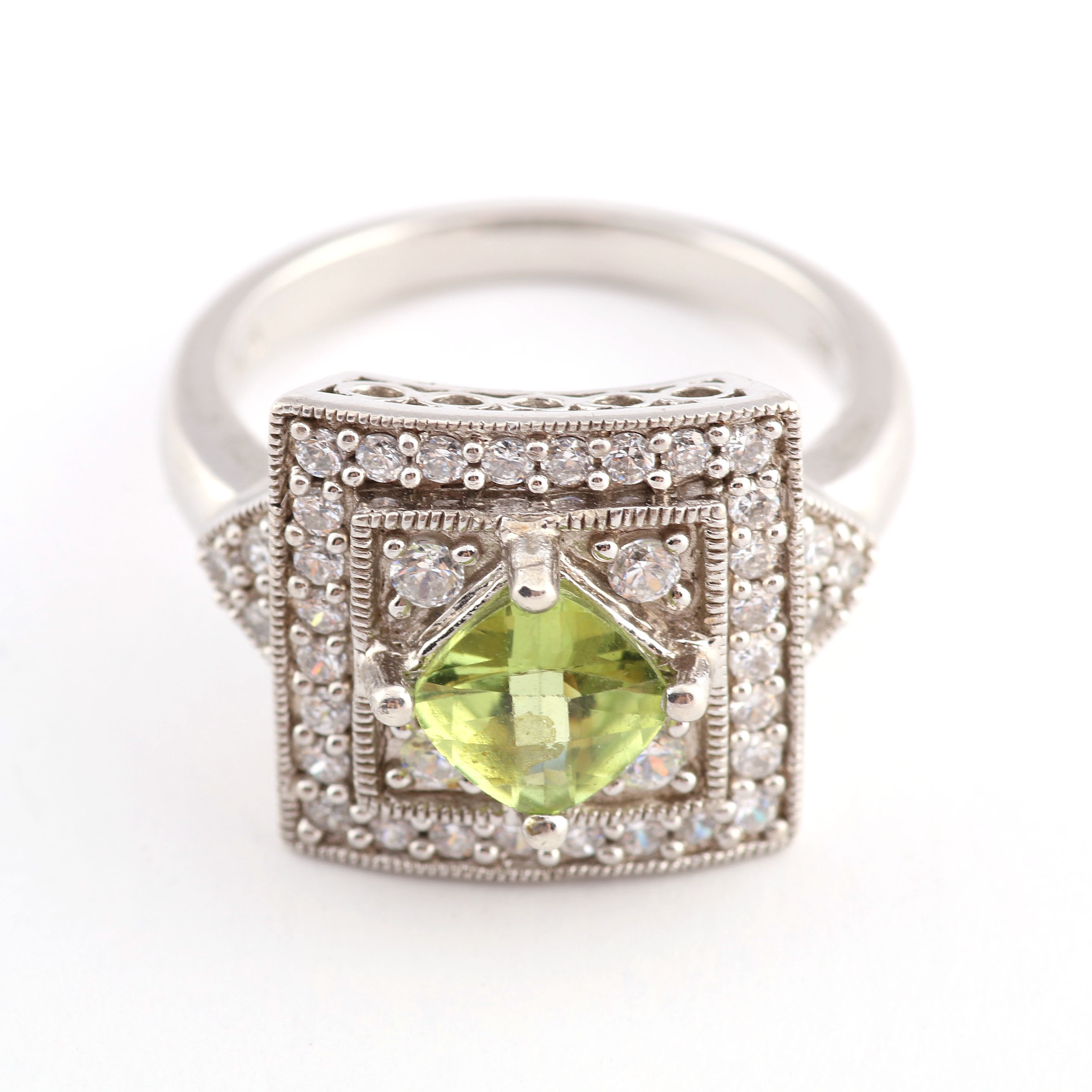 Sterling and Peridot Ring in Cubic Zirconia Setting