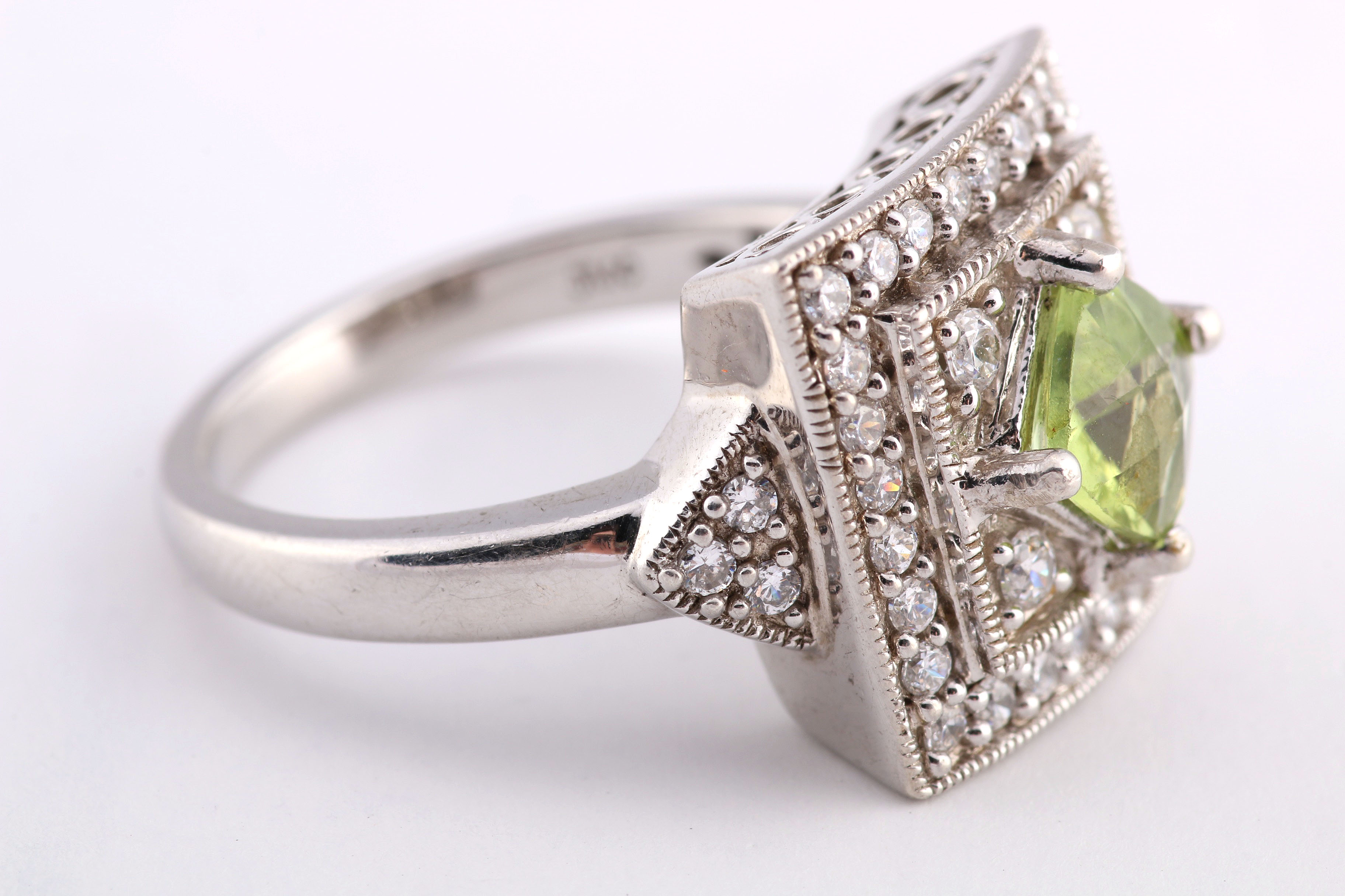 Sterling and Peridot Ring in Cubic Zirconia Setting