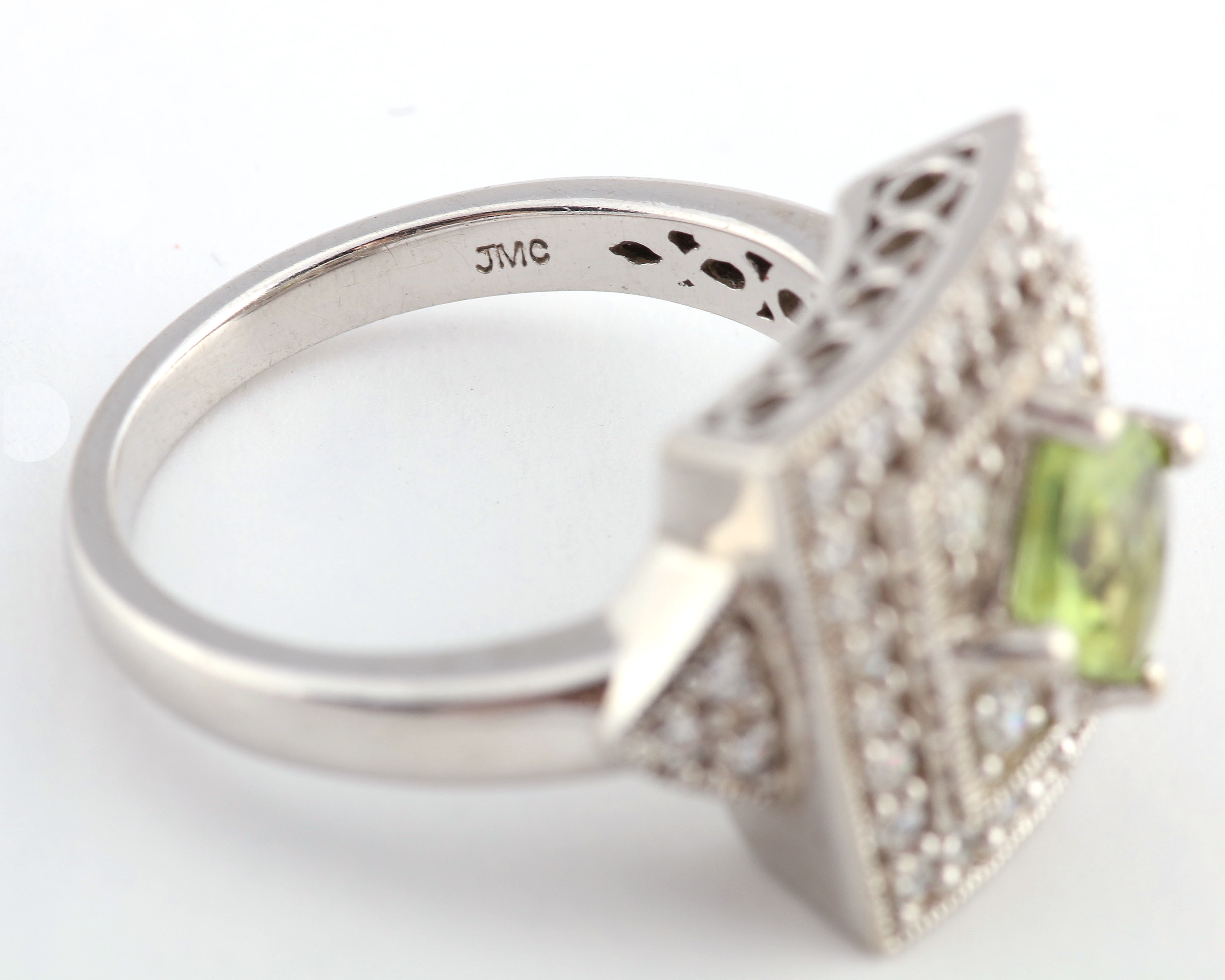 Sterling and Peridot Ring in Cubic Zirconia Setting