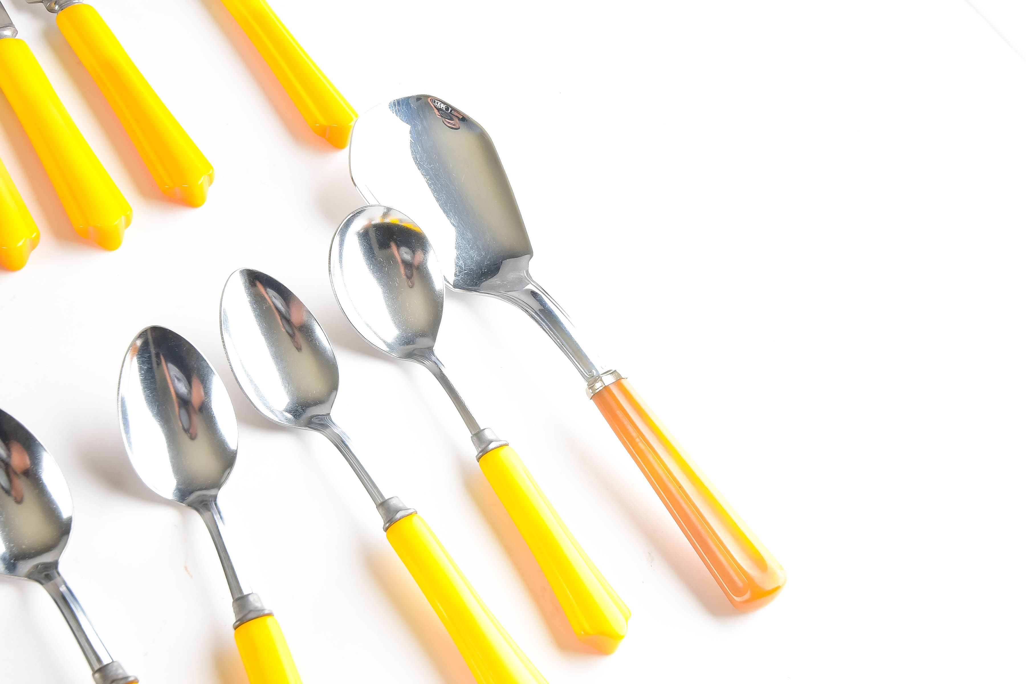 Collection of Vintage Stainless and Bakelite Flatware