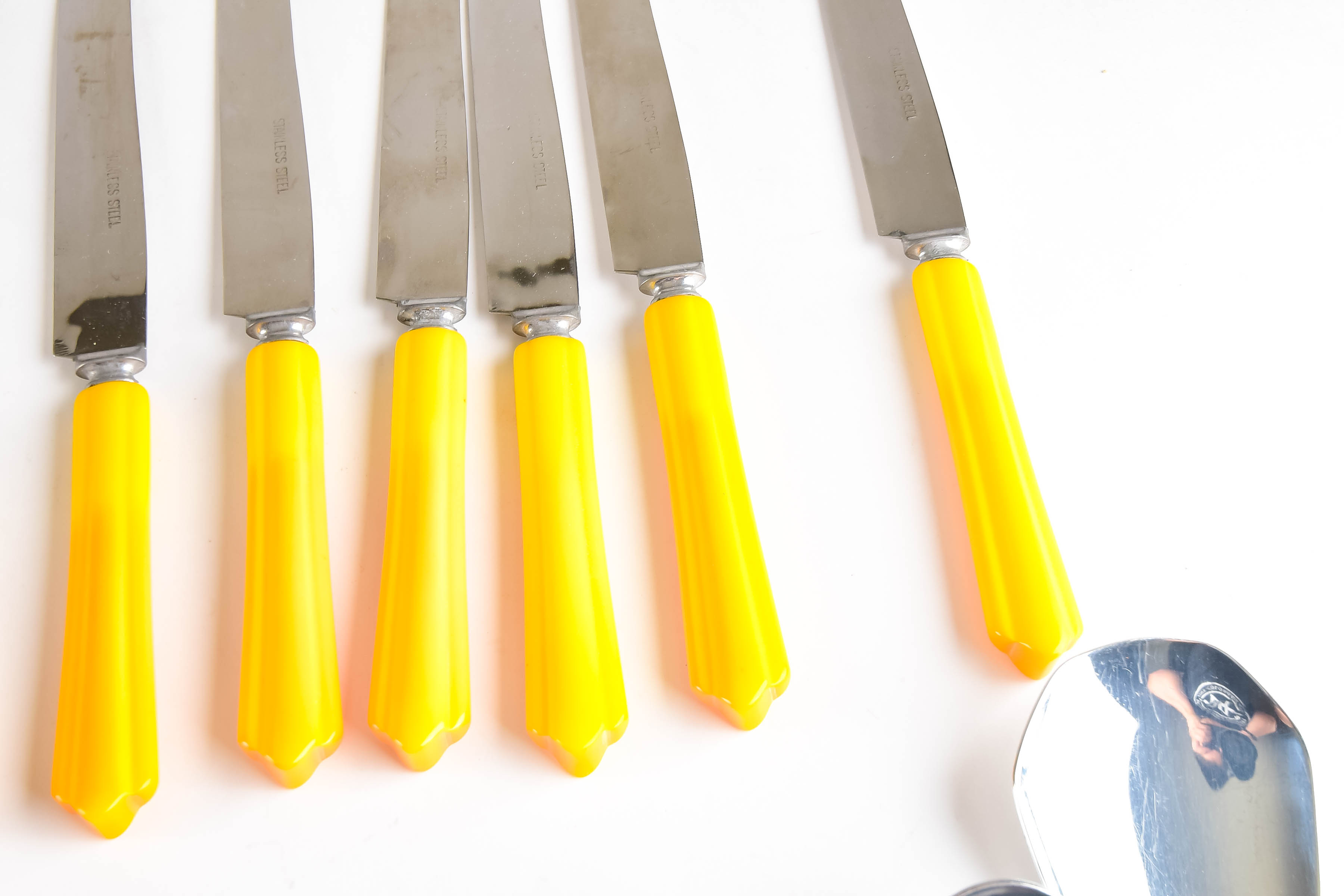 Collection of Vintage Stainless and Bakelite Flatware