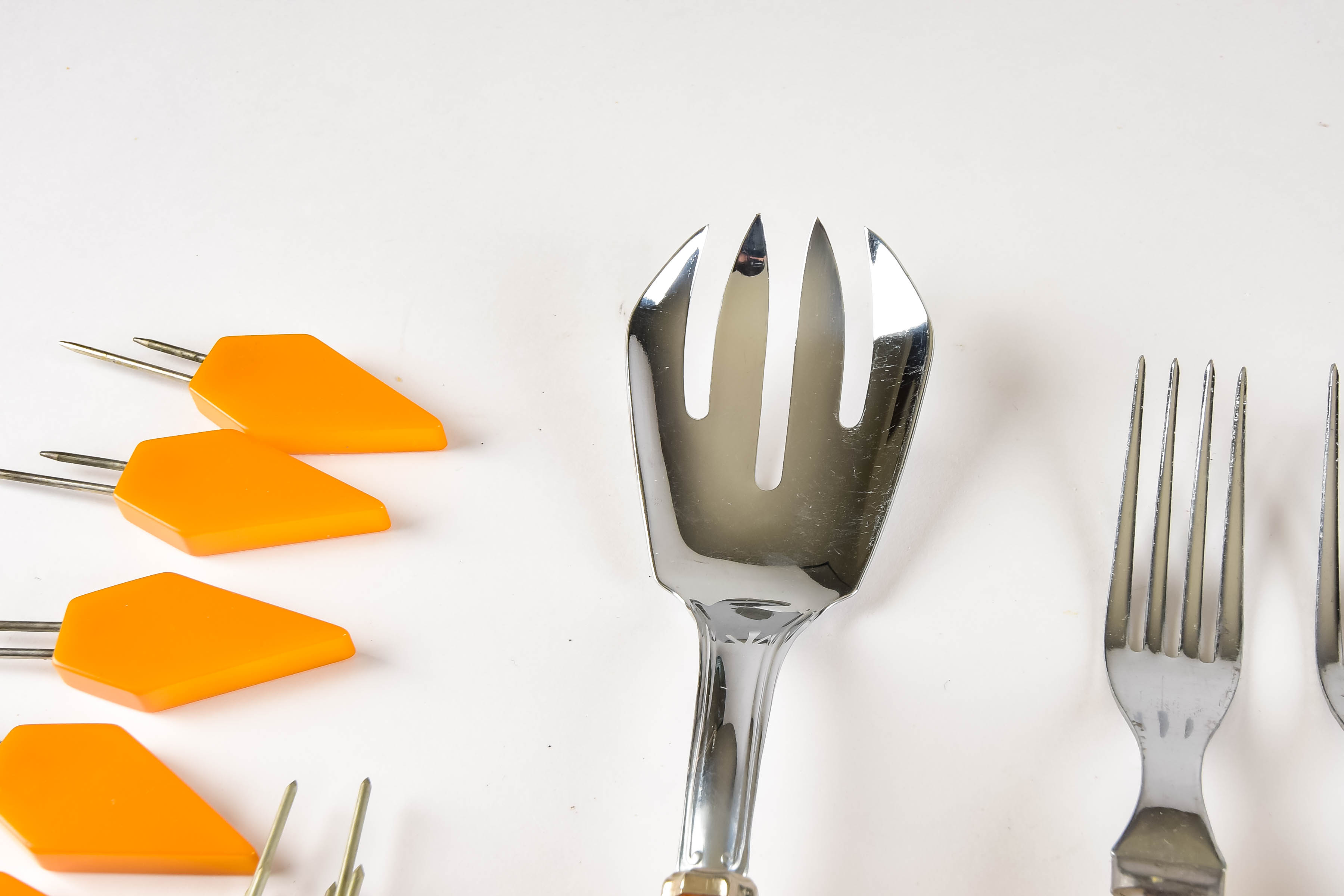 Collection of Vintage Stainless and Bakelite Flatware